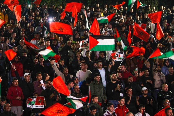 Palestinian supporters for Morocco’s national football team celebrate in the occupied West Bank city of Nablus during the 2022 World Cup match between Morocco and Portugal. (Photo by Nasser Ishtayeh/SOPA Images/LightRocket via Getty Images)