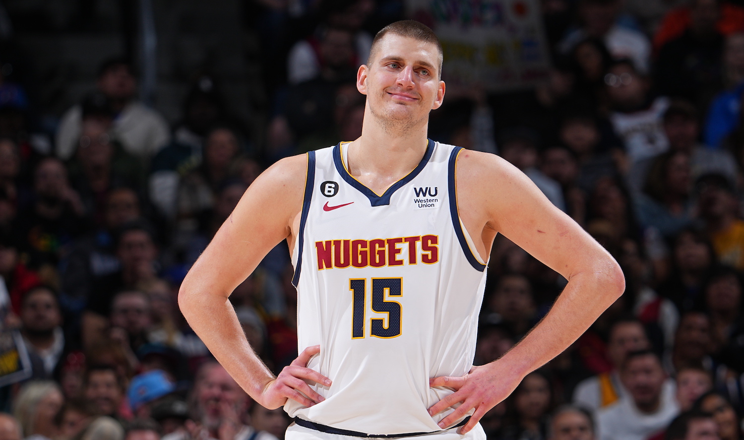 DENVER, CO - DECEMBER 10: Nikola Jokic #15 of the Denver Nuggets smiles during the game against the Utah Jazz on December 10, 2022 at the Ball Arena in Denver, Colorado. NOTE TO USER: User expressly acknowledges and agrees that, by downloading and/or using this Photograph, user is consenting to the terms and conditions of the Getty Images License Agreement. Mandatory Copyright Notice: Copyright 2022 NBAE (Photo by Bart Young/NBAE via Getty Images)