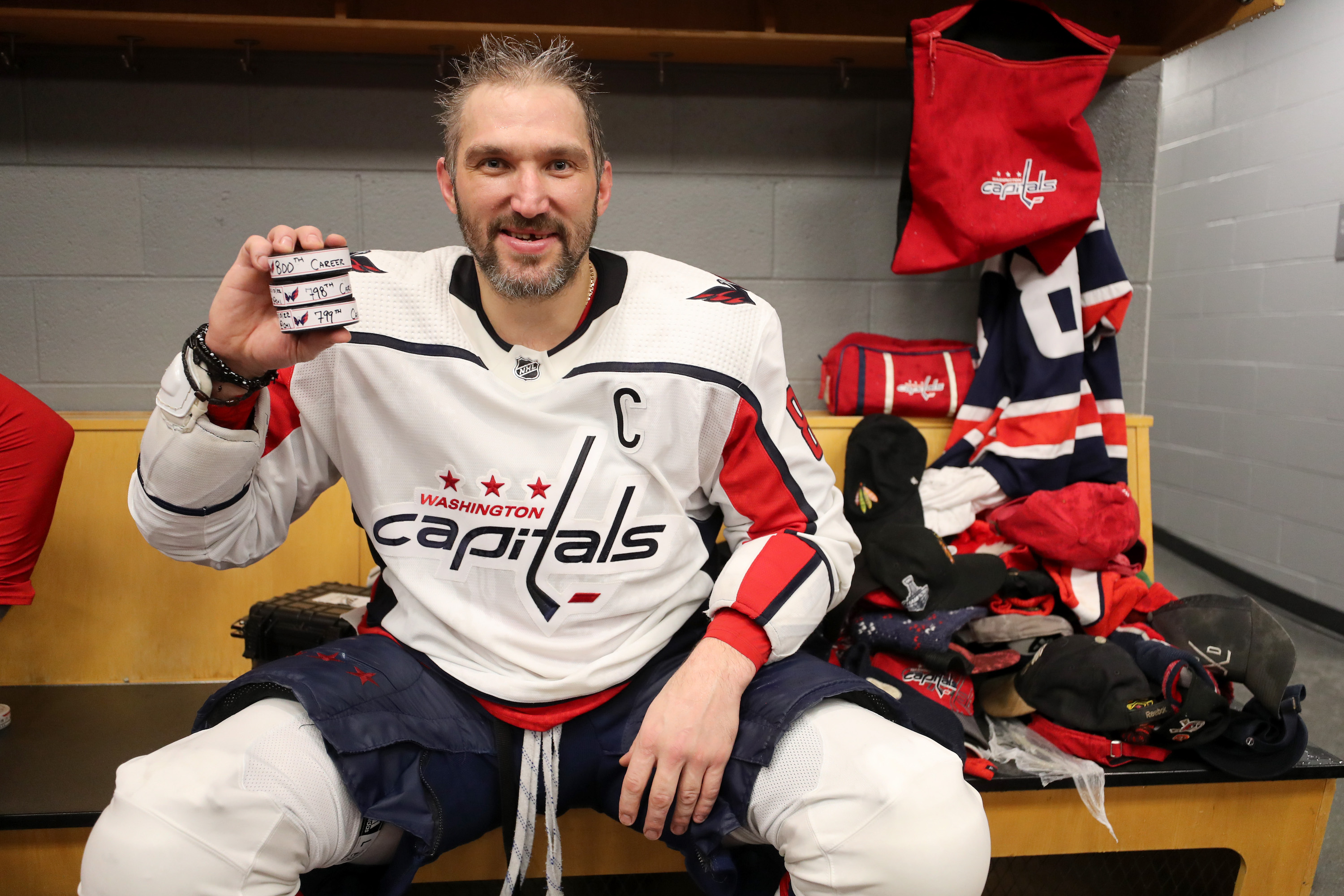 CHICAGO, ILLINOIS - DECEMBER 13: Alex Ovechkin #8 of the Washington Capitals poses for a photo after scoring a hat-trick and his 800th career goal, following the game against the Chicago Blackhawks at United Center on December 13, 2022 in Chicago, Illinois. (Photo by Chase Agnello-Dean/NHLI via Getty Images)