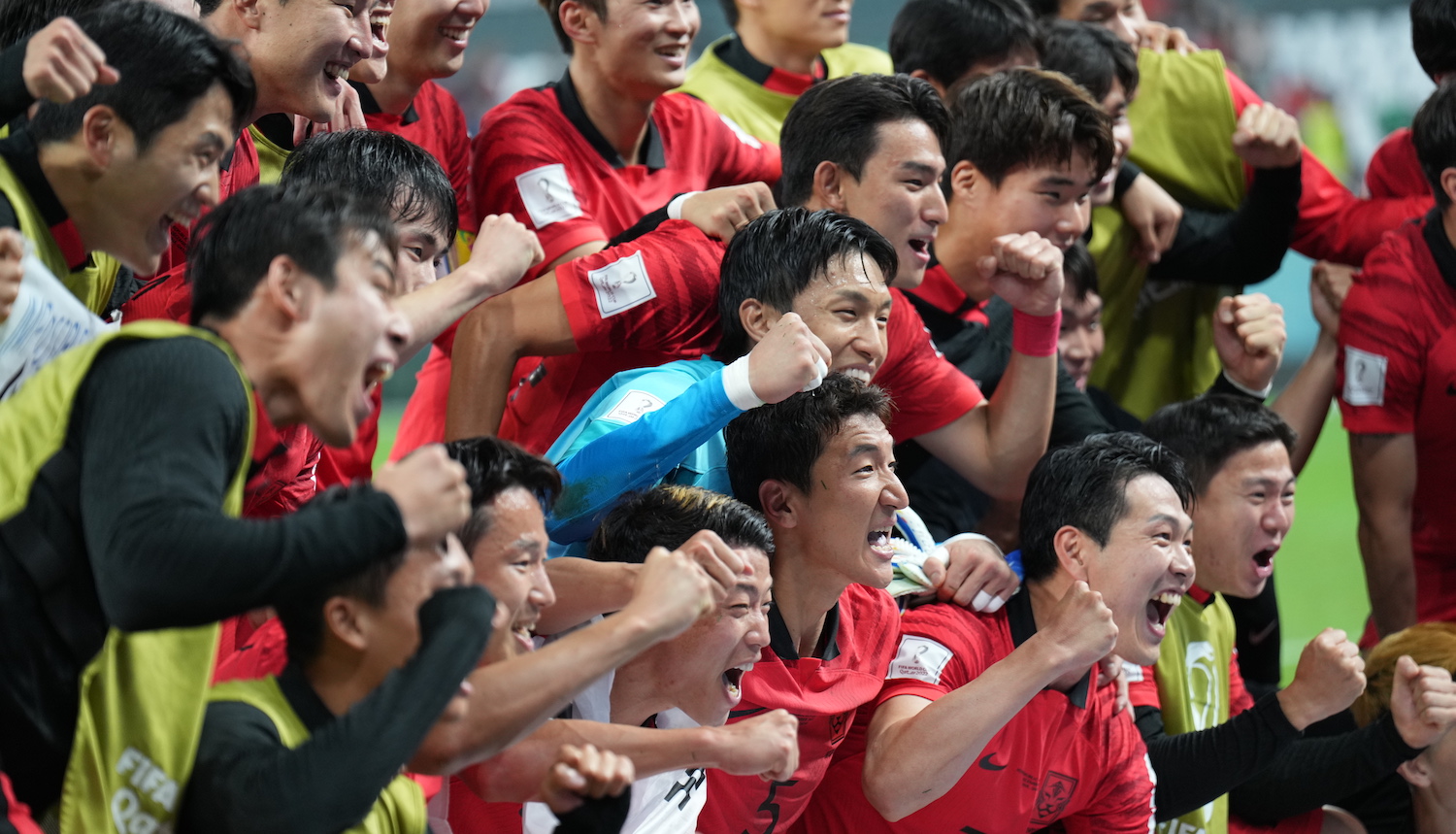 AL RAYYAN, QATAR - DECEMBER 02: Players of Korea celebrate during the FIFA World Cup Qatar 2022 Group H match between Korea Republic and Portugal at Education City Stadium on December 02, 2022 in Al Rayyan, Qatar. (Photo by Amin Mohammad Jamali/Getty Images)