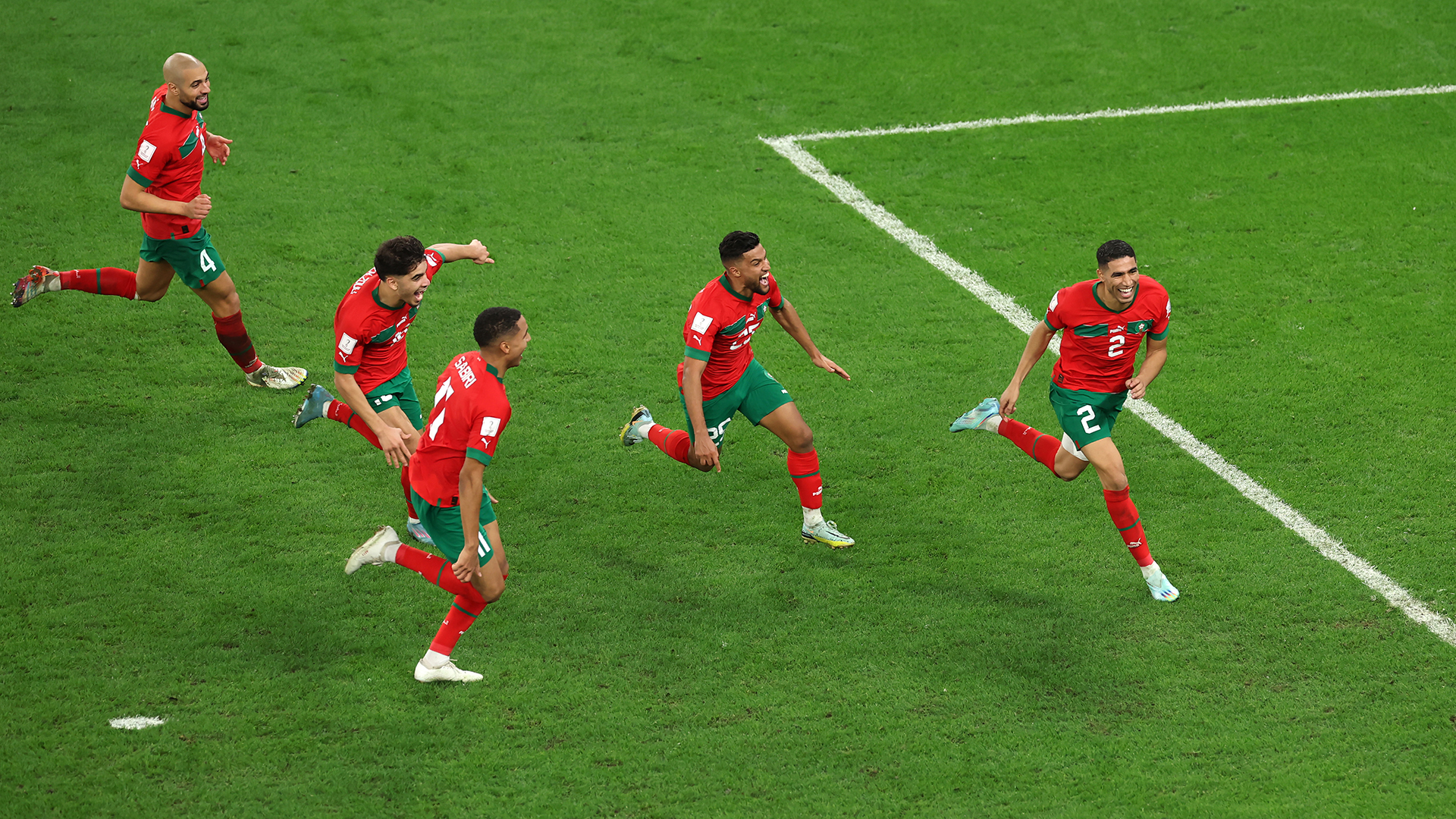 Achraf Hakimi of Morocco celebrates after the team's victory in the penalty shoot out during the FIFA World Cup Qatar 2022 Round of 16 match between Morocco and Spain at Education City Stadium on December 06, 2022 in Al Rayyan, Qatar.