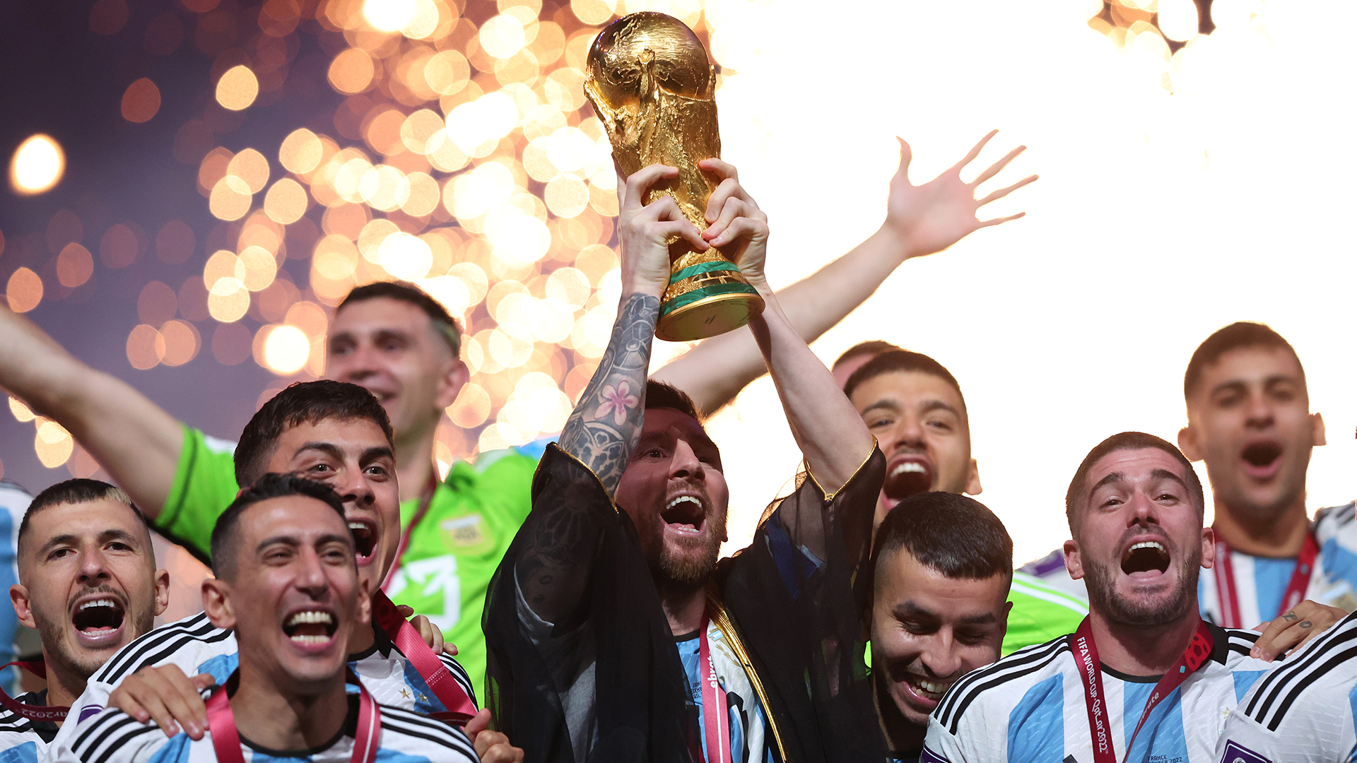 Lionel Messi, Captain of Argentina lifts the FIFA World Cup Trophy following his team's victory in the FIFA World Cup Qatar 2022 Final match between Argentina and France at Lusail Stadium on December 18, 2022 in Lusail City, Qatar.