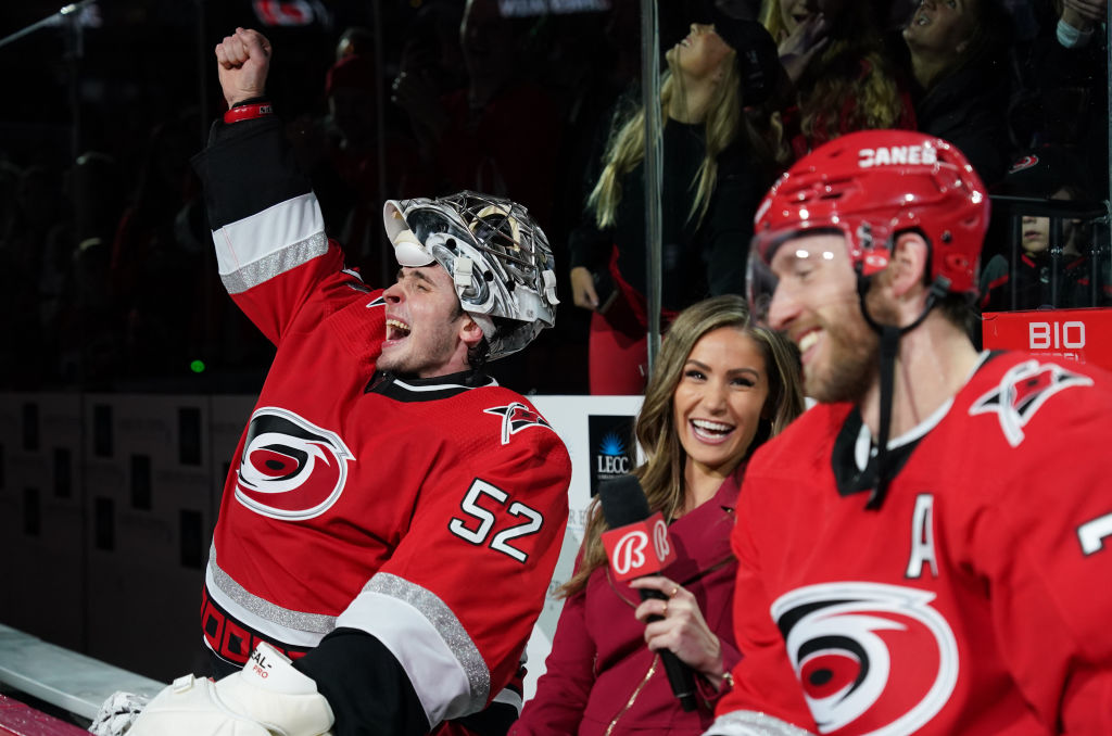 Jaccob Slavin and Pyotr Kochetkov are interviewed after a win