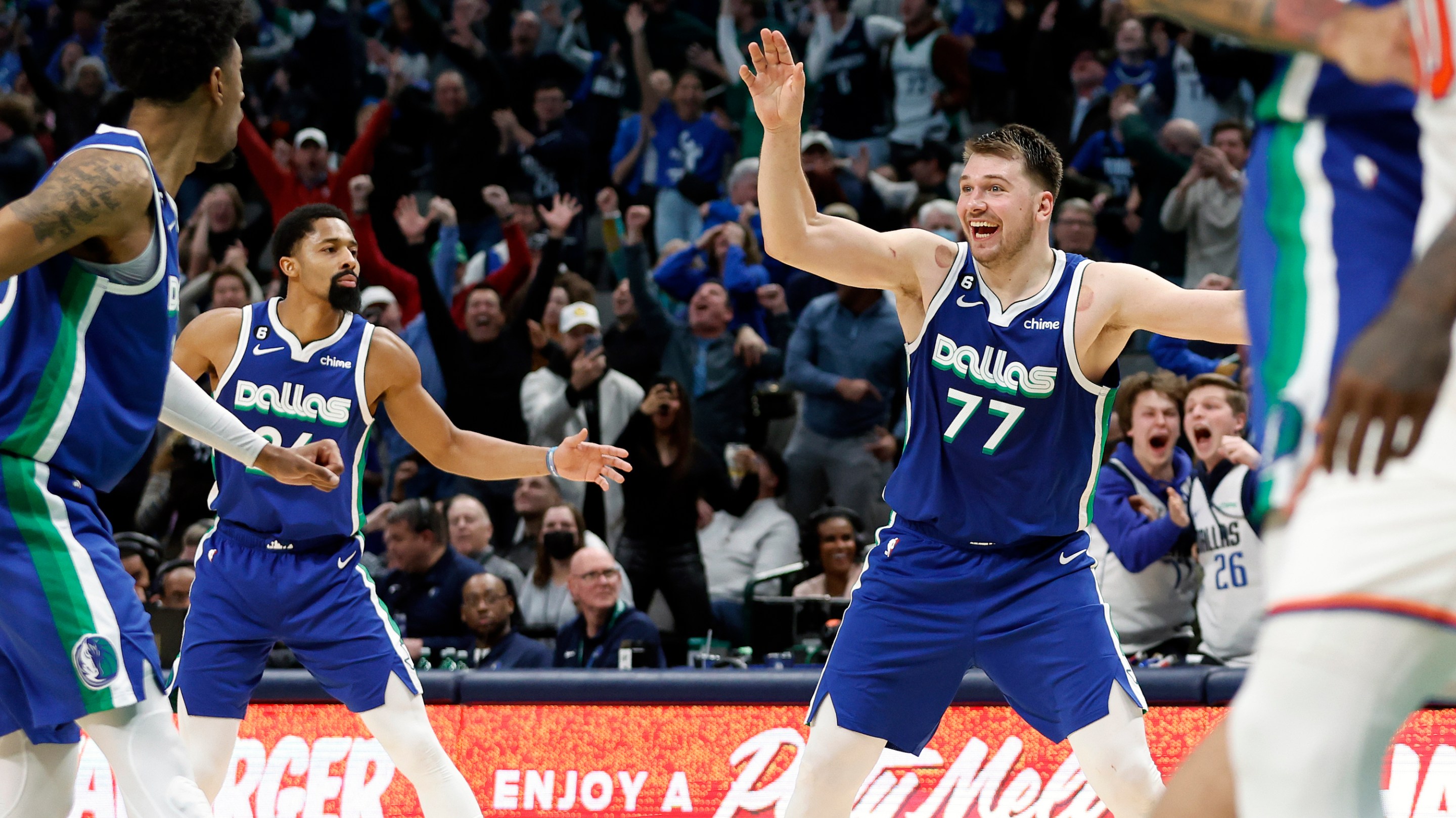Luka Doncic #77 of the Dallas Mavericks reacts after making the game tying basket against the New York Knicks with one second left in regulation to send the game to overtime at American Airlines Center on December 27, 2022 in Dallas, Texas.