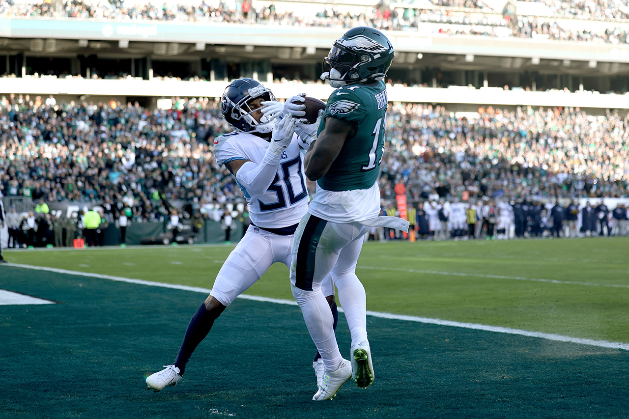 A.J. Brown #11 of the Philadelphia Eagles catches a touchdown reception over Tre Avery #30 of the Tennessee Titans during the third quarter at Lincoln Financial Field on December 04, 2022 in Philadelphia, Pennsylvania.