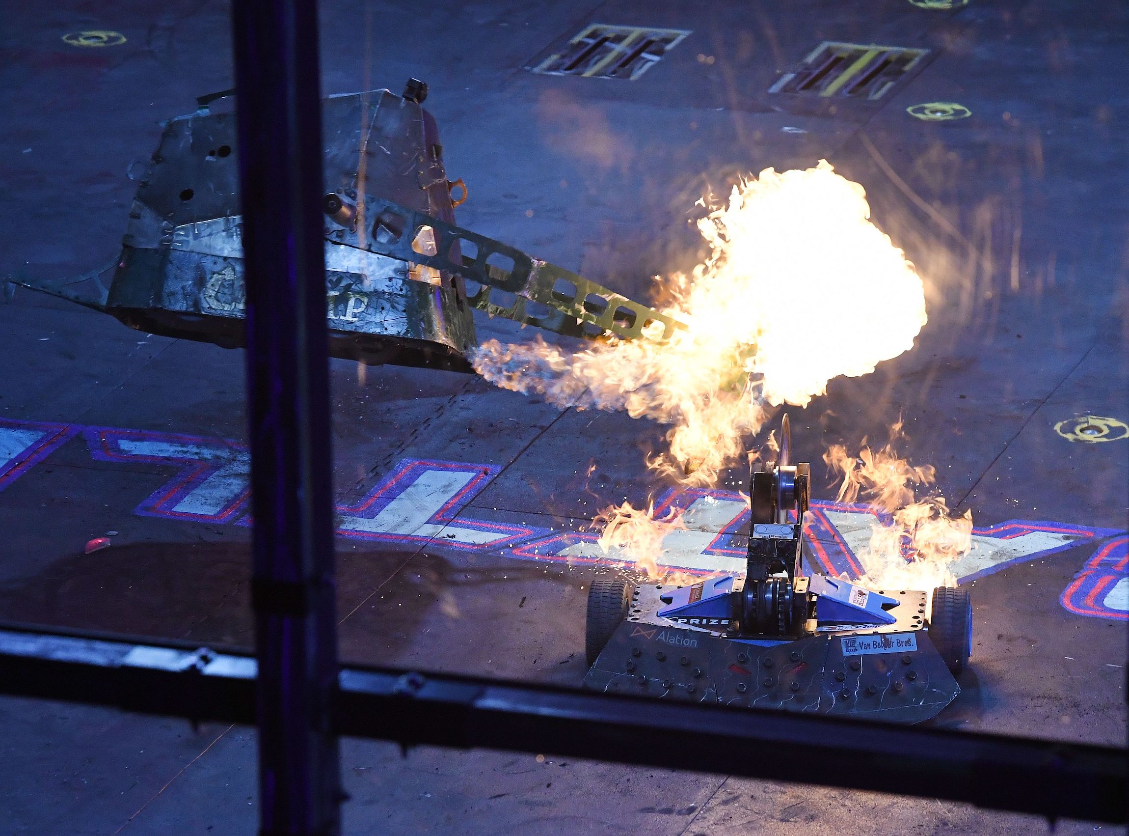 Robot Chomp (L) clashes with Robot Skorpios during the BattleBots Challenge at the Amazon Re:MARS conference on robotics and artificial intelligence at the Las Vegas Speedway, Nevada on June 6, 2019. (Photo by Mark RALSTON / AFP) (Photo by MARK RALSTON/AFP via Getty Images)