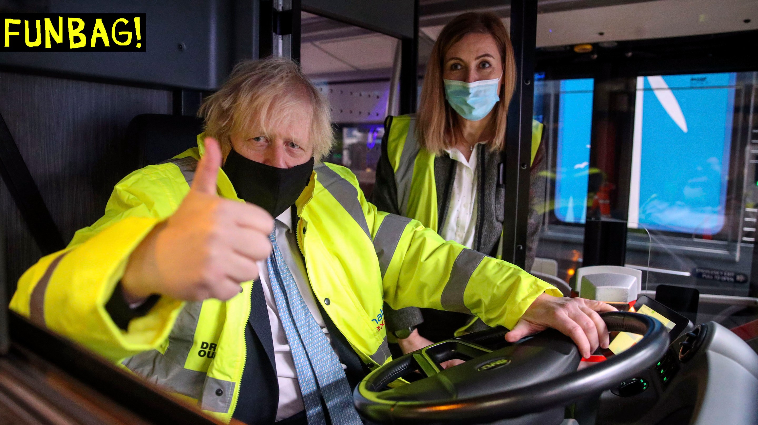 Prime Minister Boris Johnson alongside electric vehicles operations manager Agata Litwinowicz-Soltysiak during a visit to the National Express depot in Coventry. The Prime Minister is unveiling a shake-up of the bus sector which aims to see lower, simpler flat fares in towns and cities, turn-up-and-go services on main routes, and new flexible services to reconnect communities. Picture date: Monday March 15, 2021. PA Photo. See PA story POLITICS Bus. Photo credit should read: Steve Parsons/PA Wire