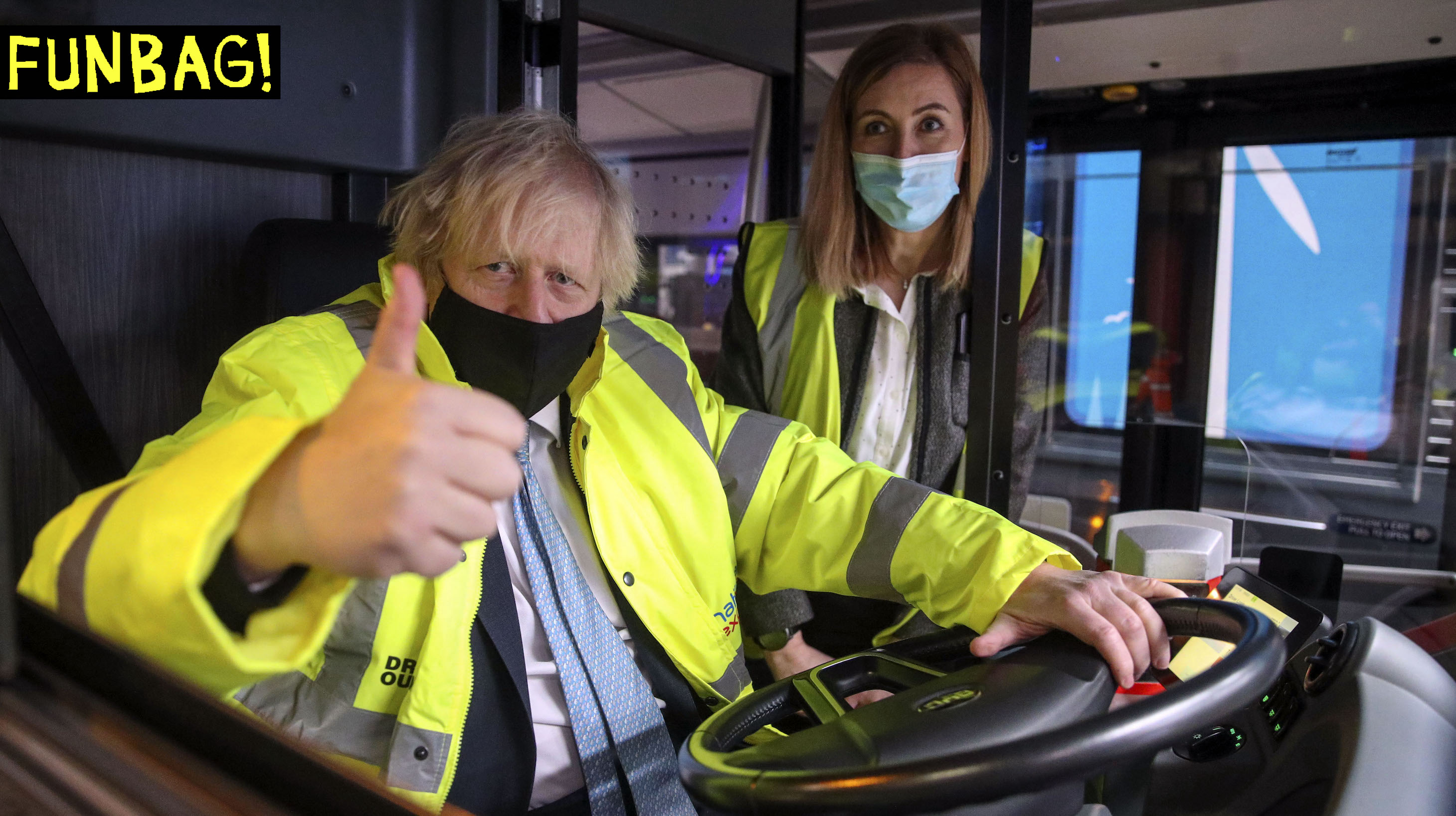 Prime Minister Boris Johnson alongside electric vehicles operations manager Agata Litwinowicz-Soltysiak during a visit to the National Express depot in Coventry. The Prime Minister is unveiling a shake-up of the bus sector which aims to see lower, simpler flat fares in towns and cities, turn-up-and-go services on main routes, and new flexible services to reconnect communities. Picture date: Monday March 15, 2021. PA Photo. See PA story POLITICS Bus. Photo credit should read: Steve Parsons/PA Wire