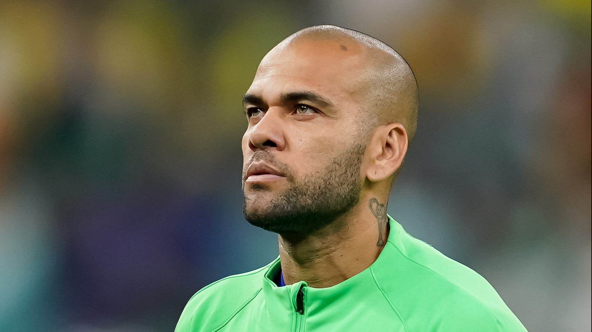 Player of Brazil Dani Alves signs the national anthem before the FIFA World Cup Qatar 2022 group G match between Brazil and Cameroon at Lusail Stadium on December 2, 2022 in Lusail, Qatar.