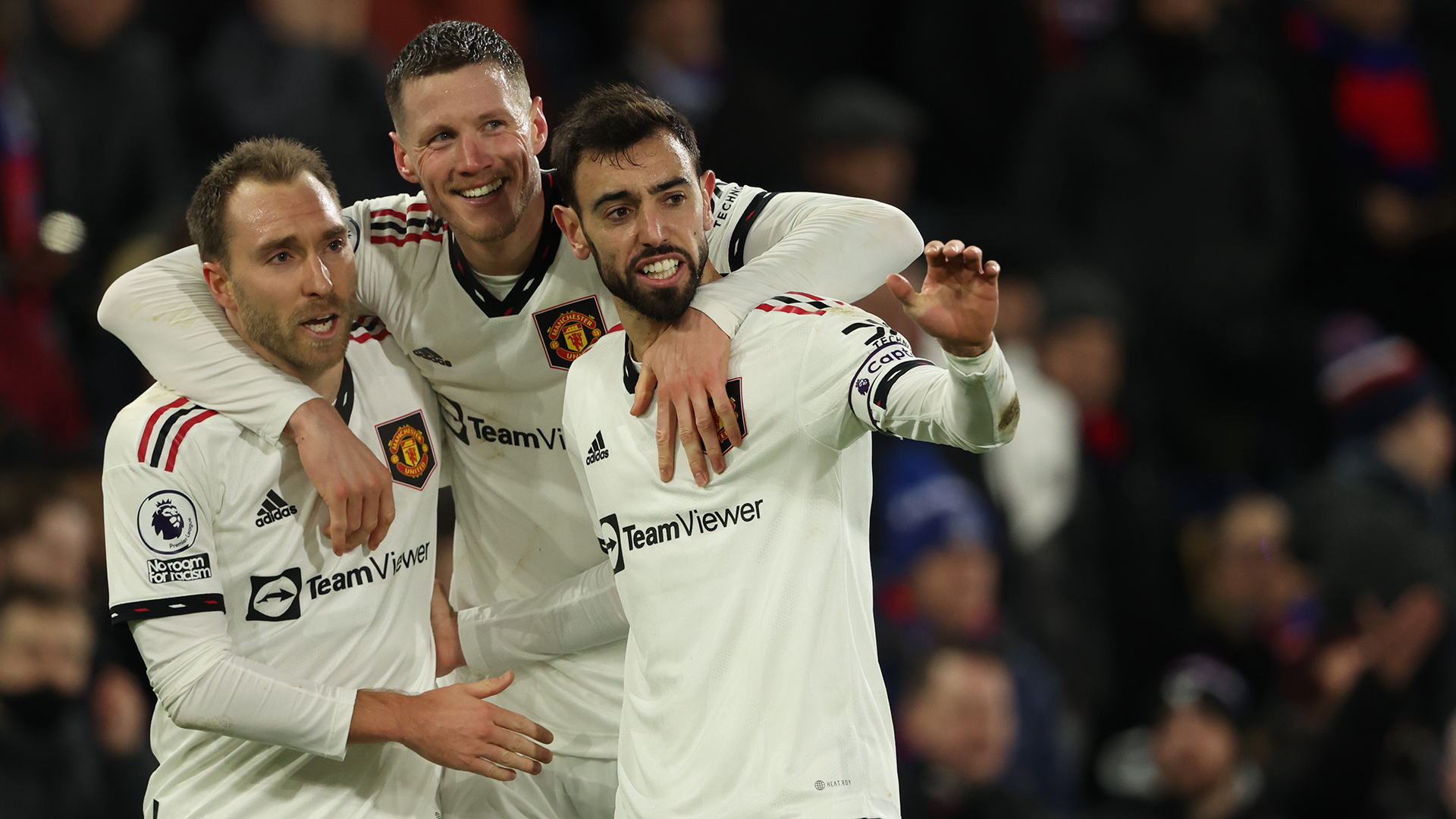 Bruno Fernandes of Manchester United celebrates after scoring a goal to make it 0-1 with Christian Eriksen and Wout Weghorst during the Premier League match between Crystal Palace and Manchester United at Selhurst Park on January 18, 2023 in London, United Kingdom.