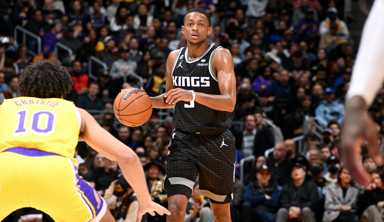 LOS ANGELES, CA - JANUARY 18: De'Aaron Fox #5 of the Sacramento Kings handles the ball during the game against the Los Angeles Lakers on January 18, 2023 at Crypto.Com Arena in Los Angeles, California. NOTE TO USER: User expressly acknowledges and agrees that, by downloading and/or using this Photograph, user is consenting to the terms and conditions of the Getty Images License Agreement. Mandatory Copyright Notice: Copyright 2023 NBAE (Photo by Andrew D. Bernstein/NBAE via Getty Images)