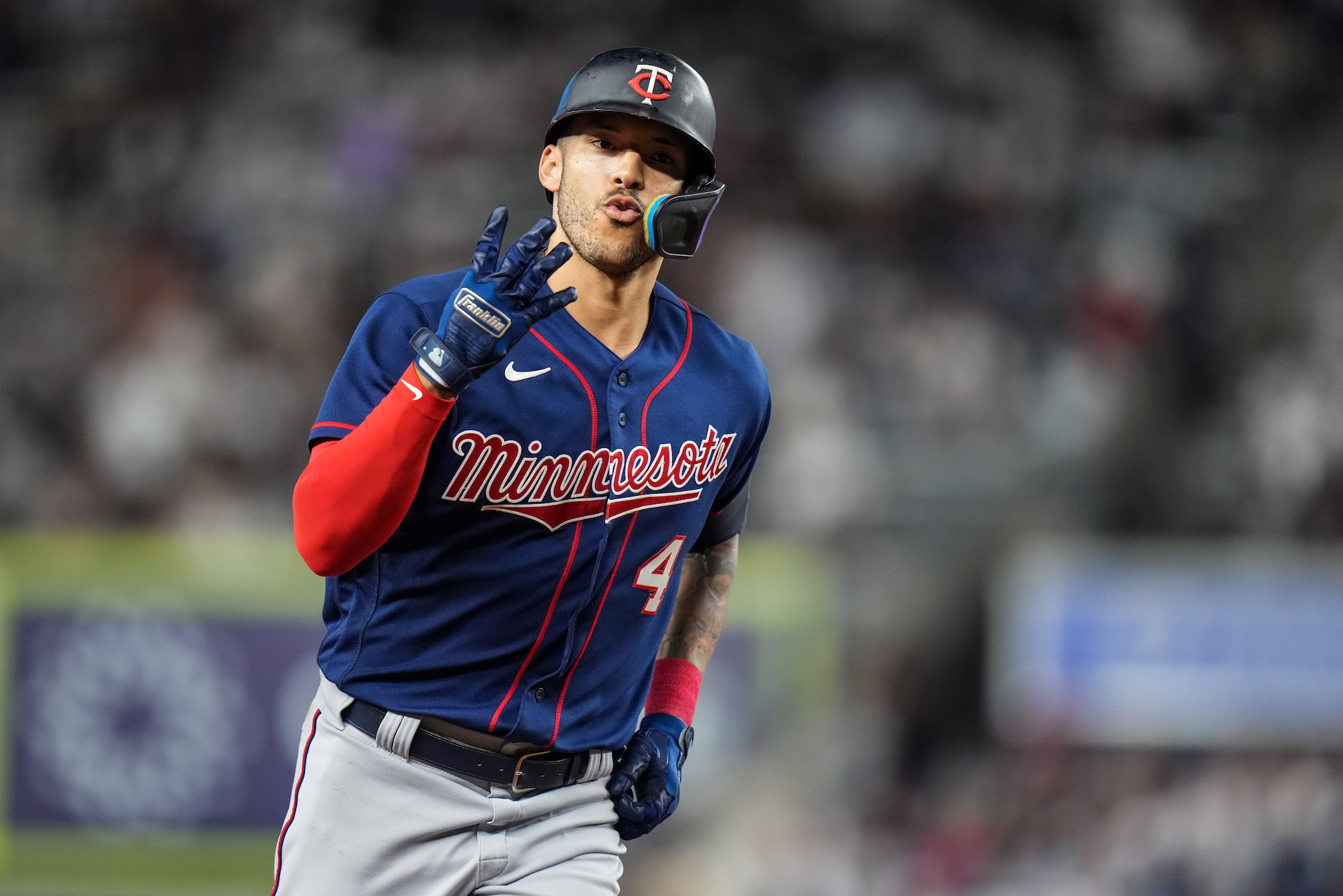 NEW YORK, NY - SEPTEMBER 08: Carlos Correa #4 of the Minnesota Twins celebrates after hitting a home run against the New York Yankees on September 8, 2022 at Yankee Stadium in New York, New York. (Photo by Brace Hemmelgarn/Minnesota Twins/Getty Images)