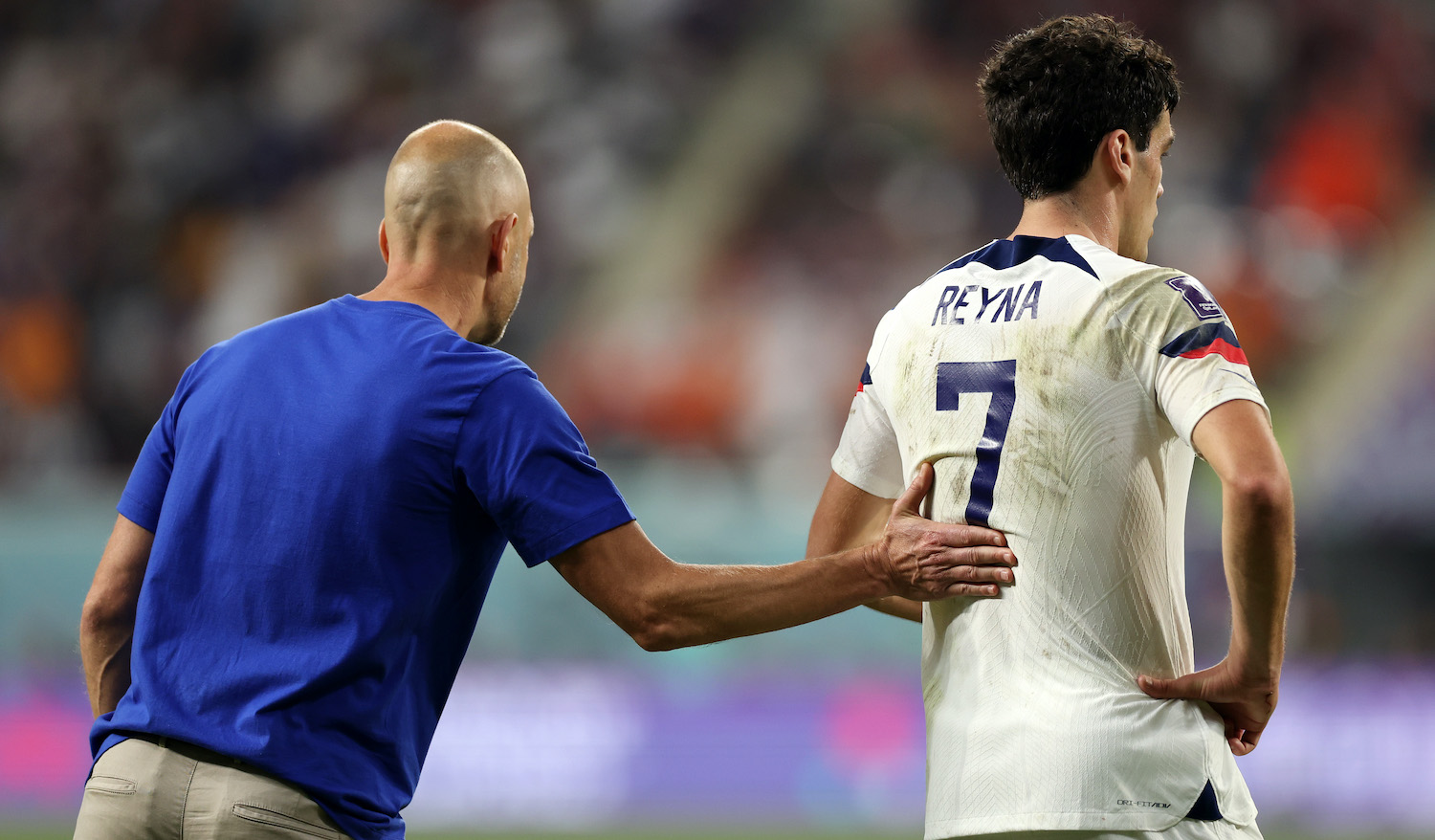 Gregg Berhalter, Head Coach of United States, gives instruction to Giovanni Reyna during the FIFA World Cup Qatar 2022 Round of 16 match between Netherlands and USA at Khalifa International Stadium on December 03, 2022 in Doha, Qatar. (Photo by Patrick Smith - FIFA/FIFA via Getty Images)