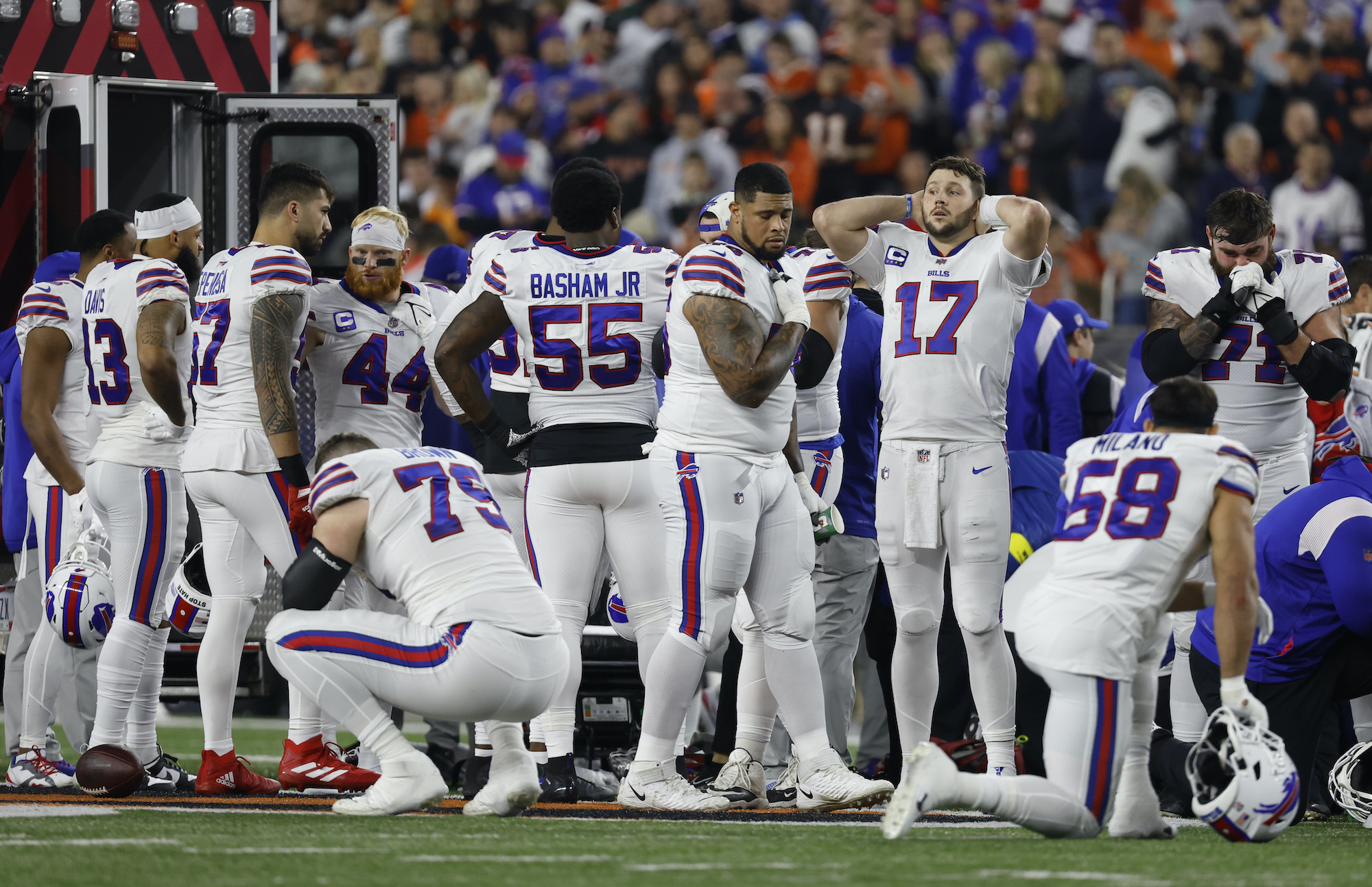 Buffalo Bills players react after teammate Damar Hamlin #3 was injured against the Cincinnati Bengals during the first quarter at Paycor Stadium on January 02, 2023 in Cincinnati, Ohio.