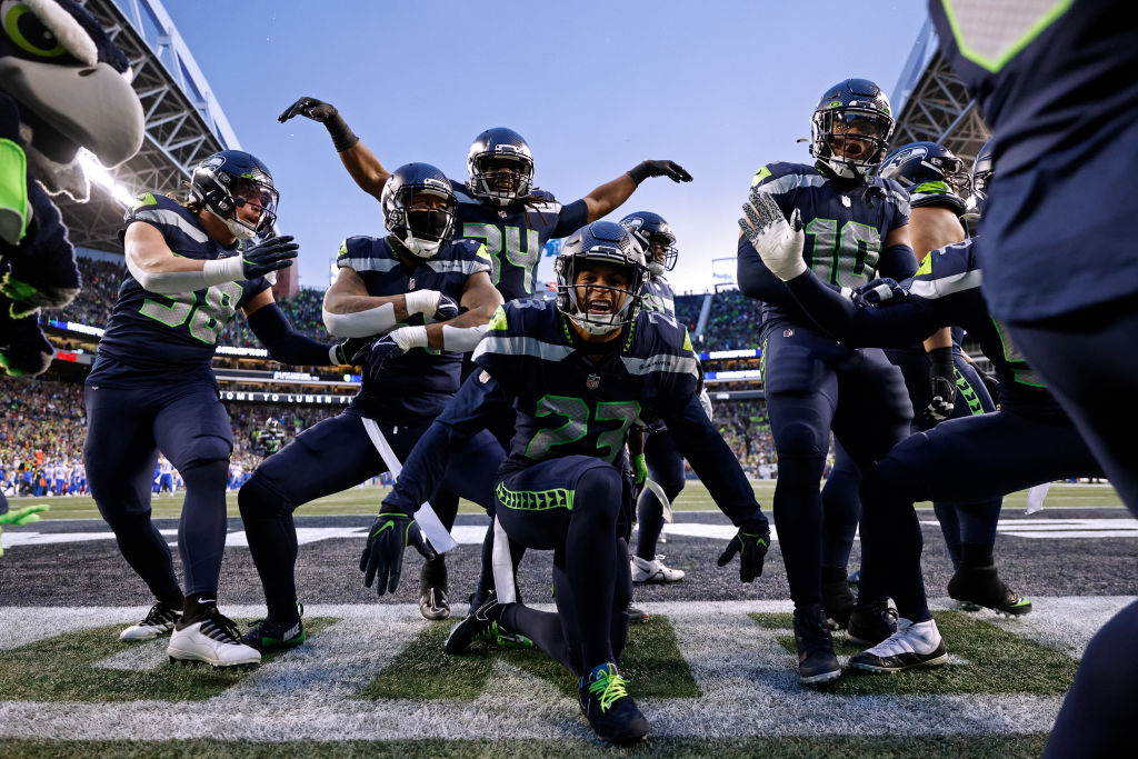 The Seattle Seahawks celebrate an interception