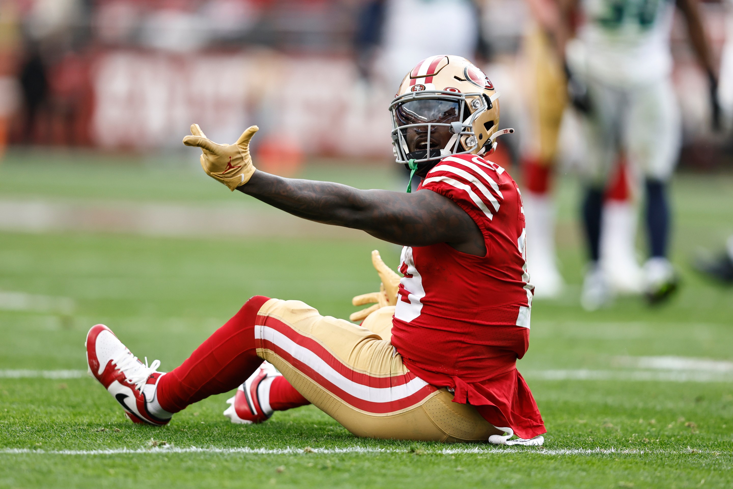 SANTA CLARA, CALIFORNIA - JANUARY 14: Deebo Samuel #19 of the San Francisco 49ers reacts after a run during an NFL football game between the San Francisco 49ers and the Seattle Seahawks at Levi's Stadium on January 14, 2023 in Santa Clara, California.