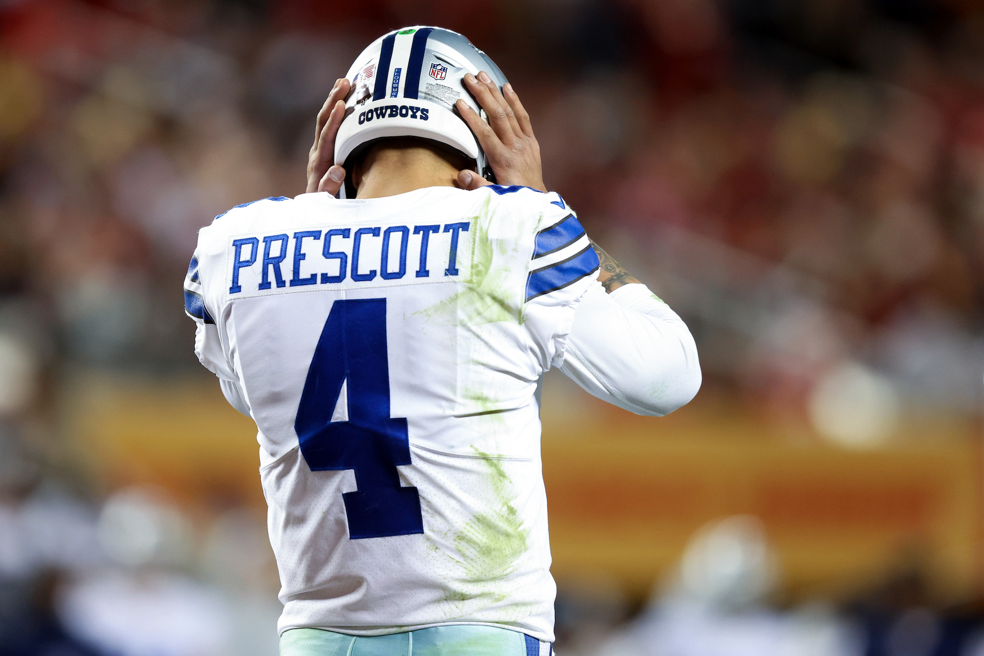 SANTA CLARA, CALIFORNIA - JANUARY 22: Dak Prescott #4 of the Dallas Cowboys reacts during the second half of the game against the San Francisco 49ers in the NFC Divisional Playoff game at Levi's Stadium on January 22, 2023 in Santa Clara, California. (Photo by Lachlan Cunningham/Getty Images)