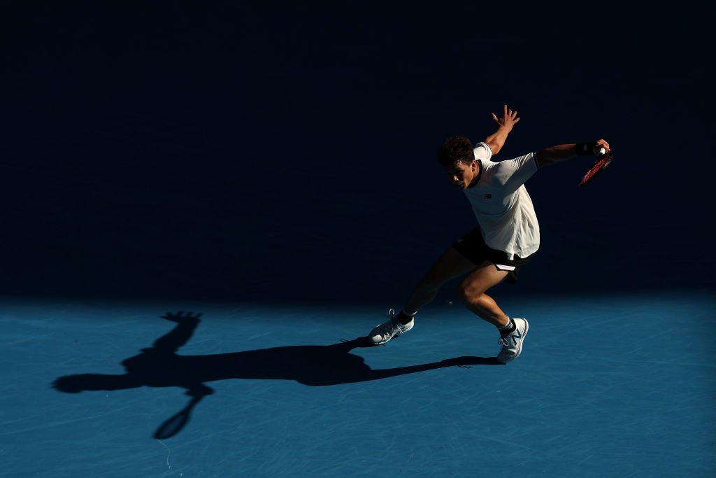 Ben Shelton of the United States plays a backhand in the Quarterfinal singles match against Tommy Paul of the United States during day ten of the 2023 Australian Open at Melbourne Park
