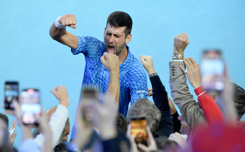 Novak Djokovic celebrates winning the Australian Open