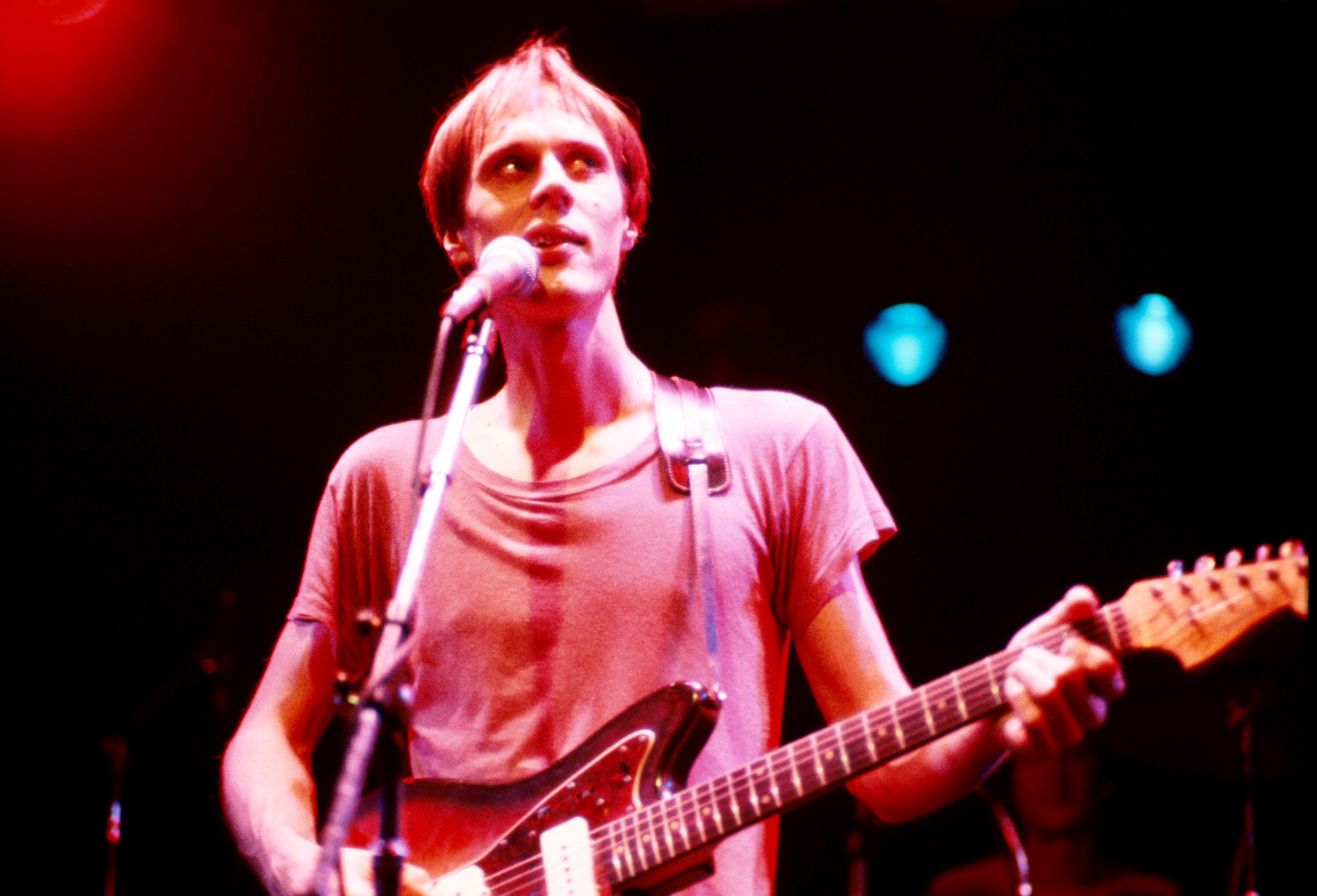 Photo of Tom Verlaine performing with Television during the 1970s.