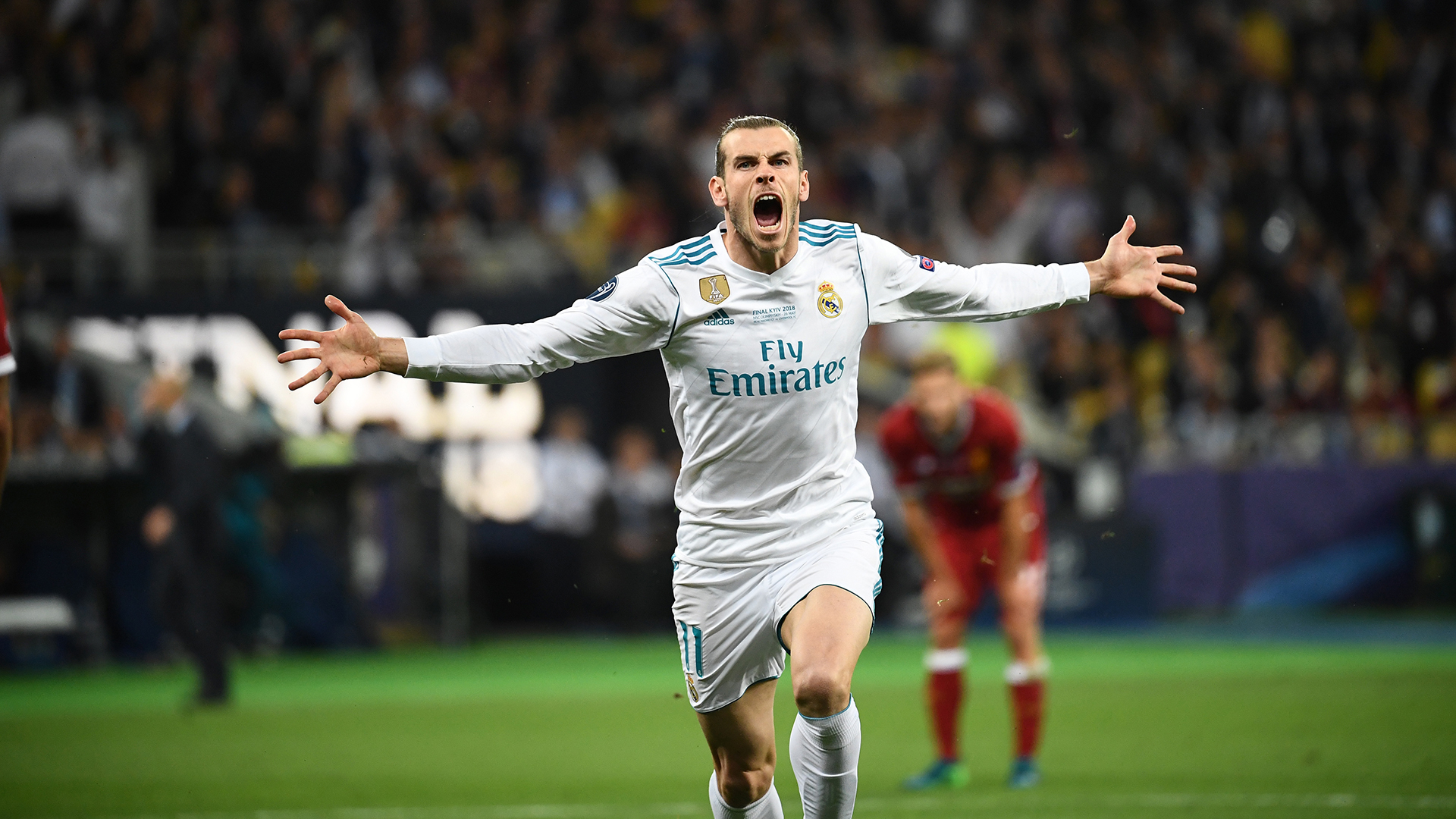 Real Madrid's Welsh forward Gareth Bale celebrates after scoring his team's second goal during the UEFA Champions League final football match between Liverpool and Real Madrid at the Olympic Stadium in Kiev, Ukraine, on May 26, 2018.