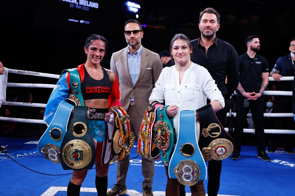 Amanda Serrano and Katie Taylor pose with their Championship belts