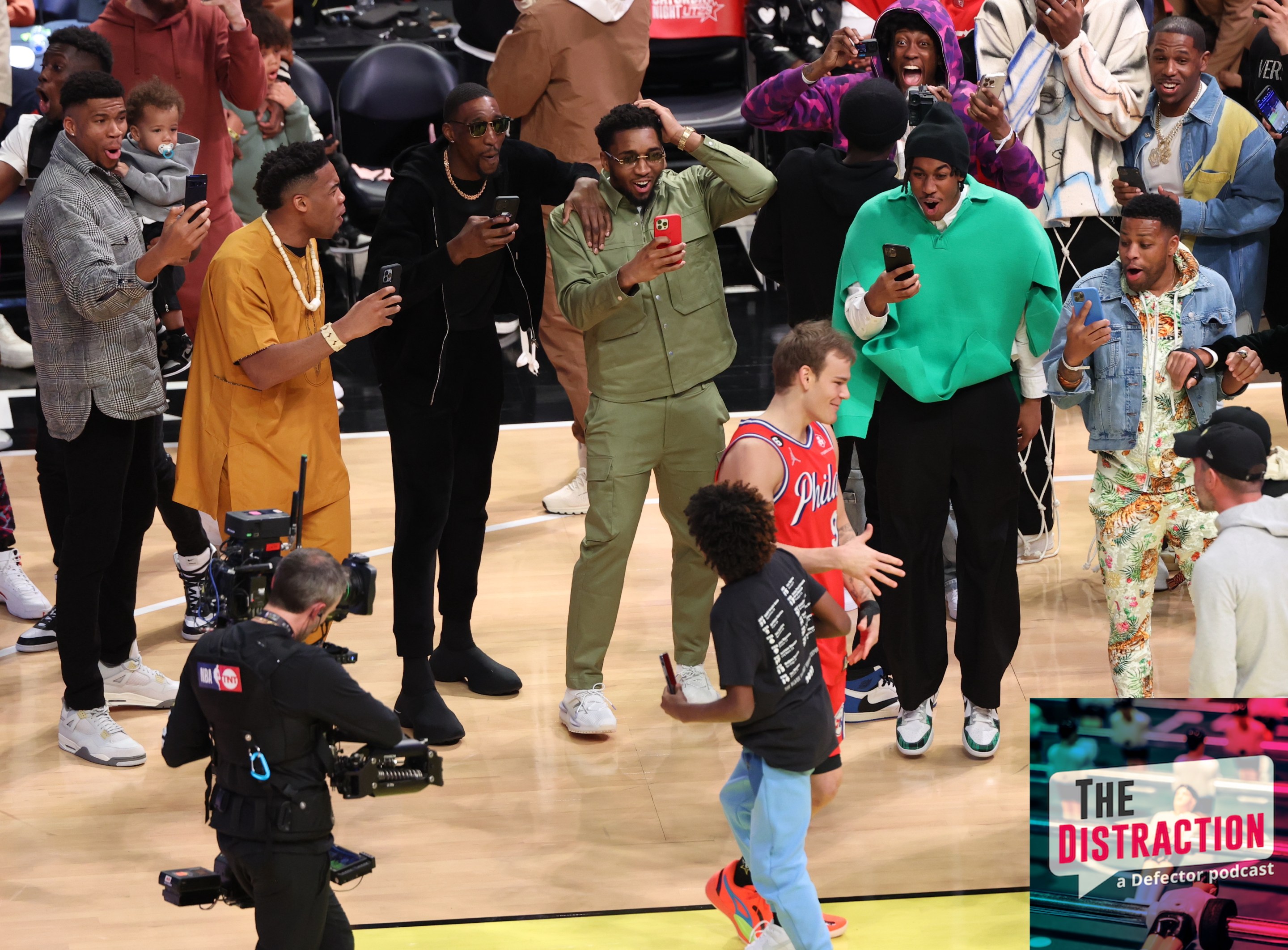 Mac McClung is congratulated by a bunch of much more high-profile NBA players after winning the Slam Dunk Contest at the 2023 NBA All-Star Weekend in Utah.