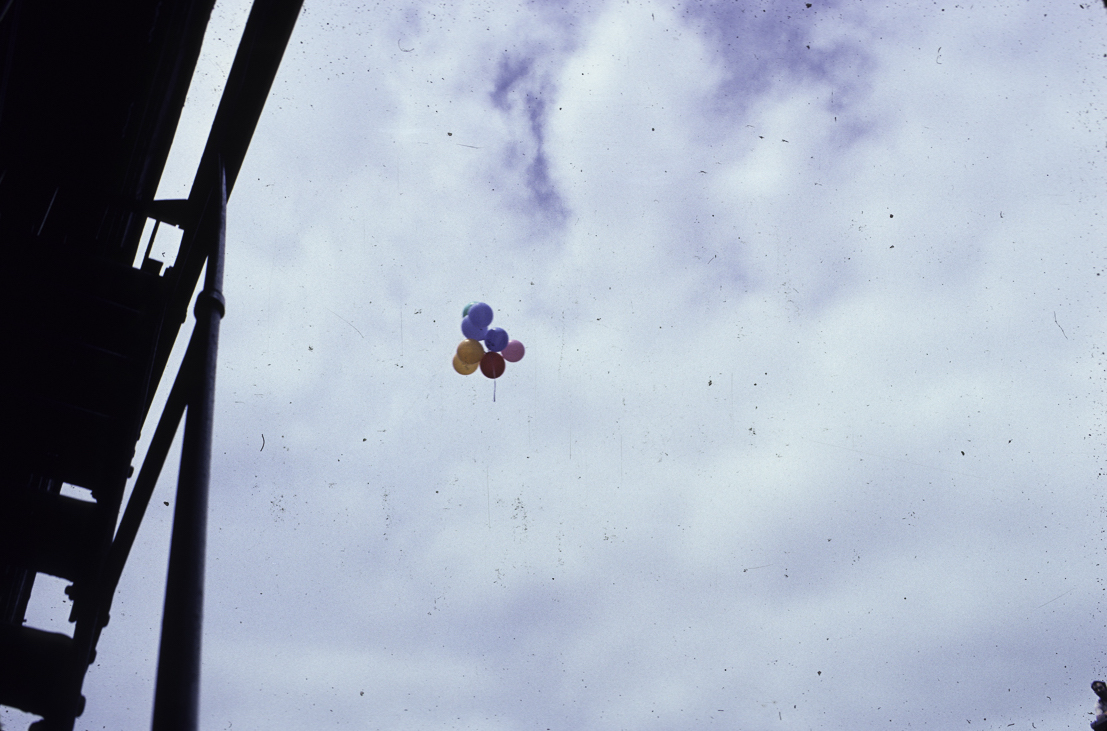 View, looking up, at a bunch of balloons released above Christopher Street (between Hudson and Bleeker streets) during the annual New York City Pride March, New York, New York, June 24, 1979. (Photo by Suzanne Poli/Getty Images)
