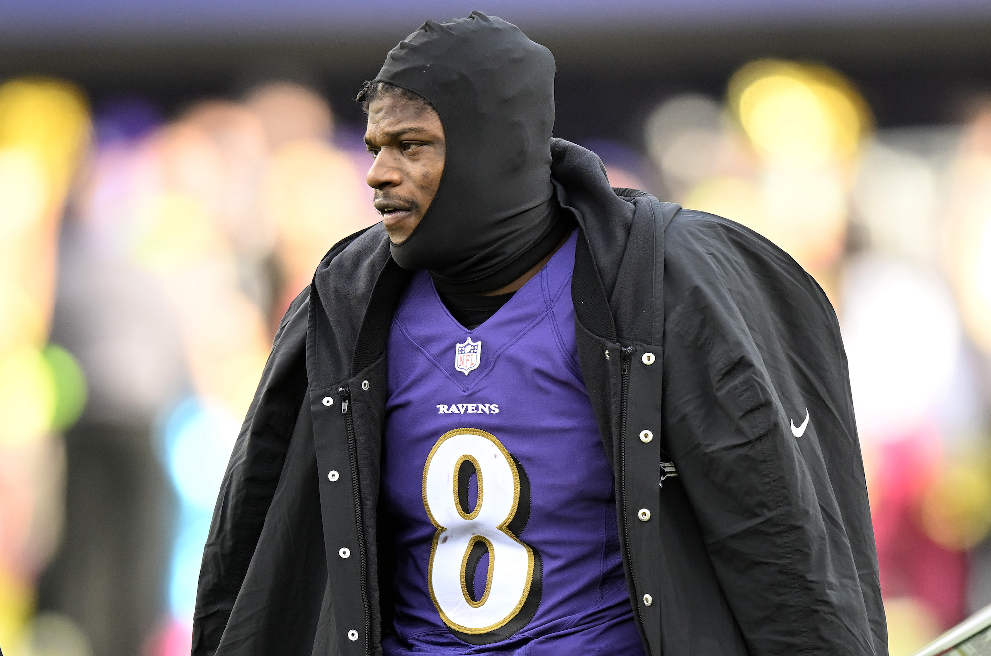 BALTIMORE, MARYLAND - DECEMBER 04: Lamar Jackson #8 of the Baltimore Ravens watches the game against the Denver Broncos at M&amp;T Bank Stadium on December 04, 2022 in Baltimore, Maryland. (Photo by G Fiume/Getty Images)