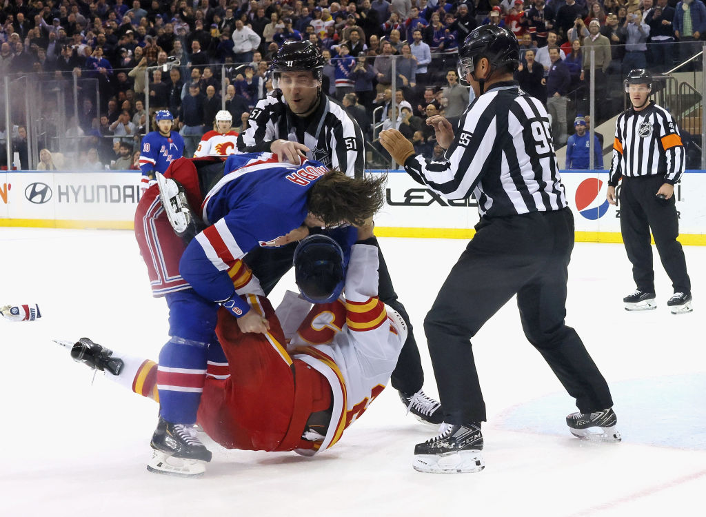 Jacob Trouba fights with Dillon Dube