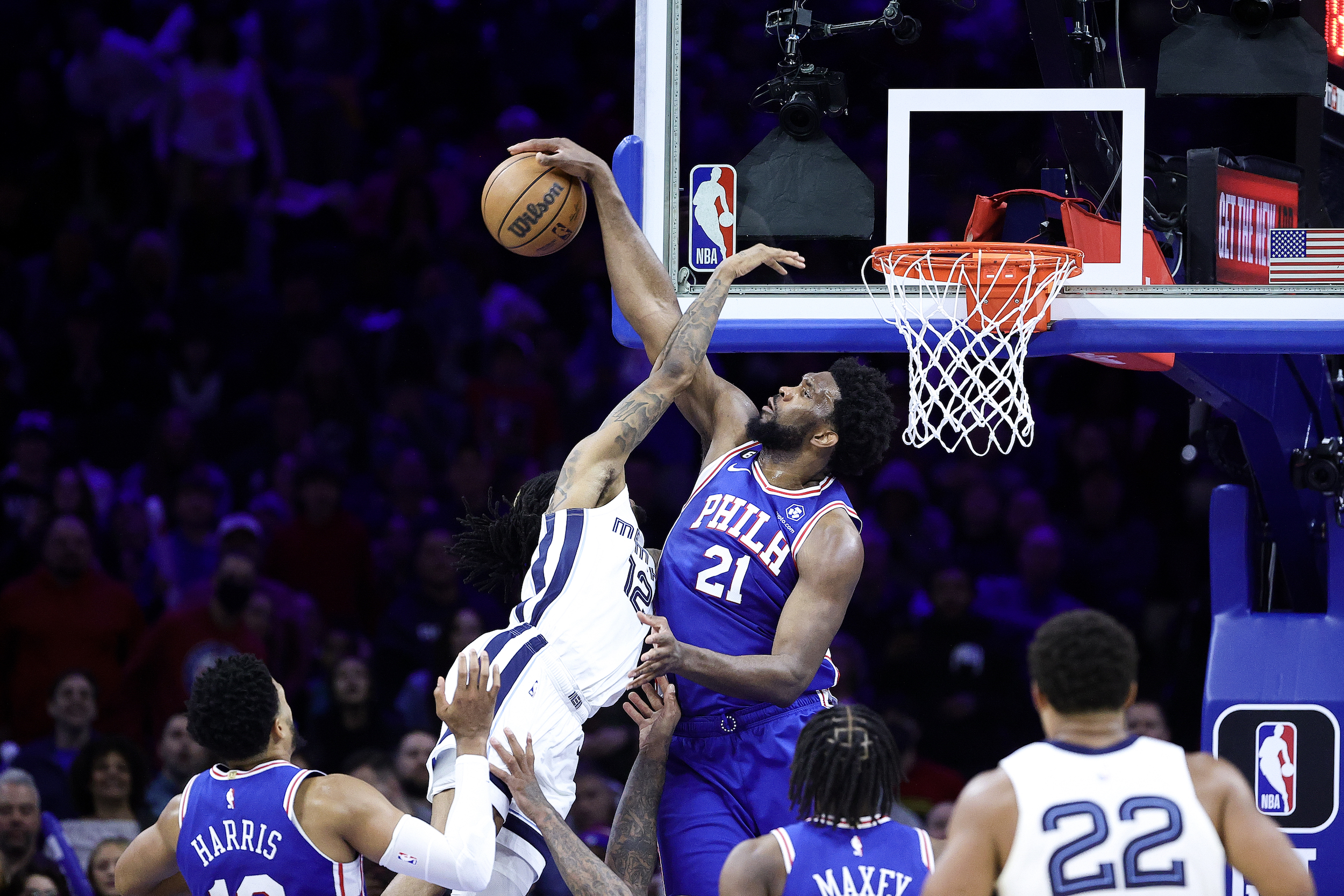 Joel Embiid blocks Ja Morant's shot attempt.