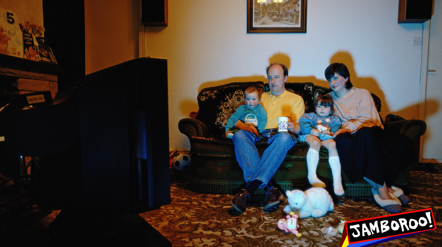 UK, Waddington, Lancashire. Family including children (2-4) sitting on sofa watching TV, night. (Photo by Christopher Pillitz/Getty Images)