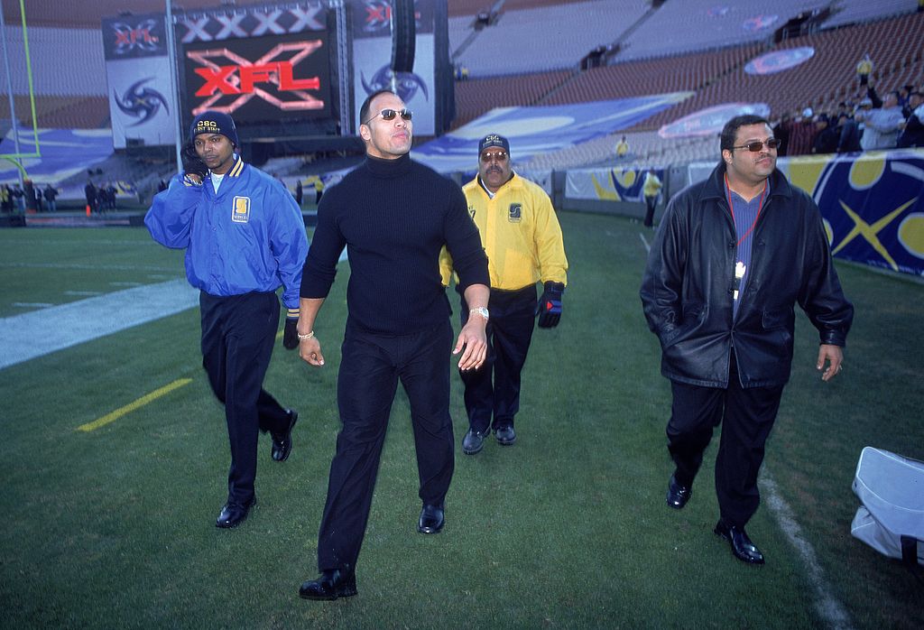 10 Feb 2001: WWF's "The Rock" walks out to greet the fans before the game between the Los Angeles Xtreme and the Chicago Enforcers at the L.A. Coliseum in Los Angeles, California. The Xtreme defeated the Enforcers 39-32.