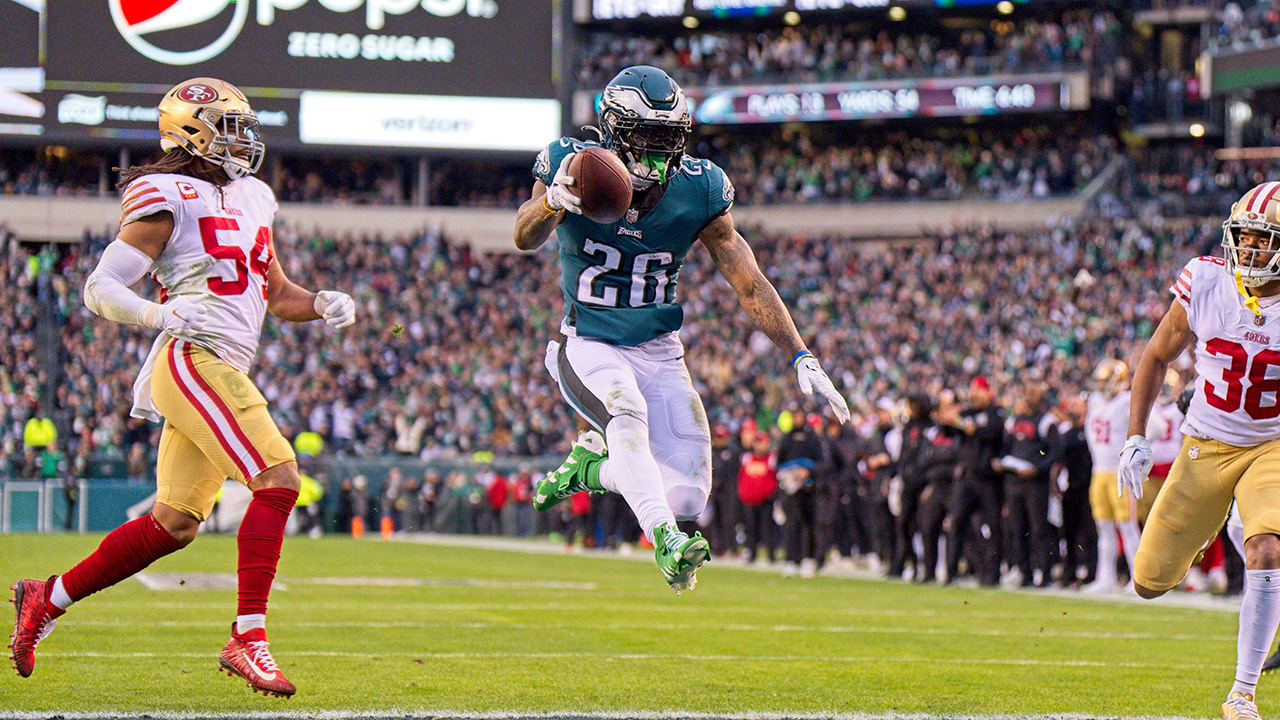 PHILADELPHIA, PA - JANUARY 29: Philadelphia Eagles running back Miles Sanders (26) leaps into the end zone during the Championship game between the San Fransisco 49ers and the Philadelphia Eagles on January 29, 2023.