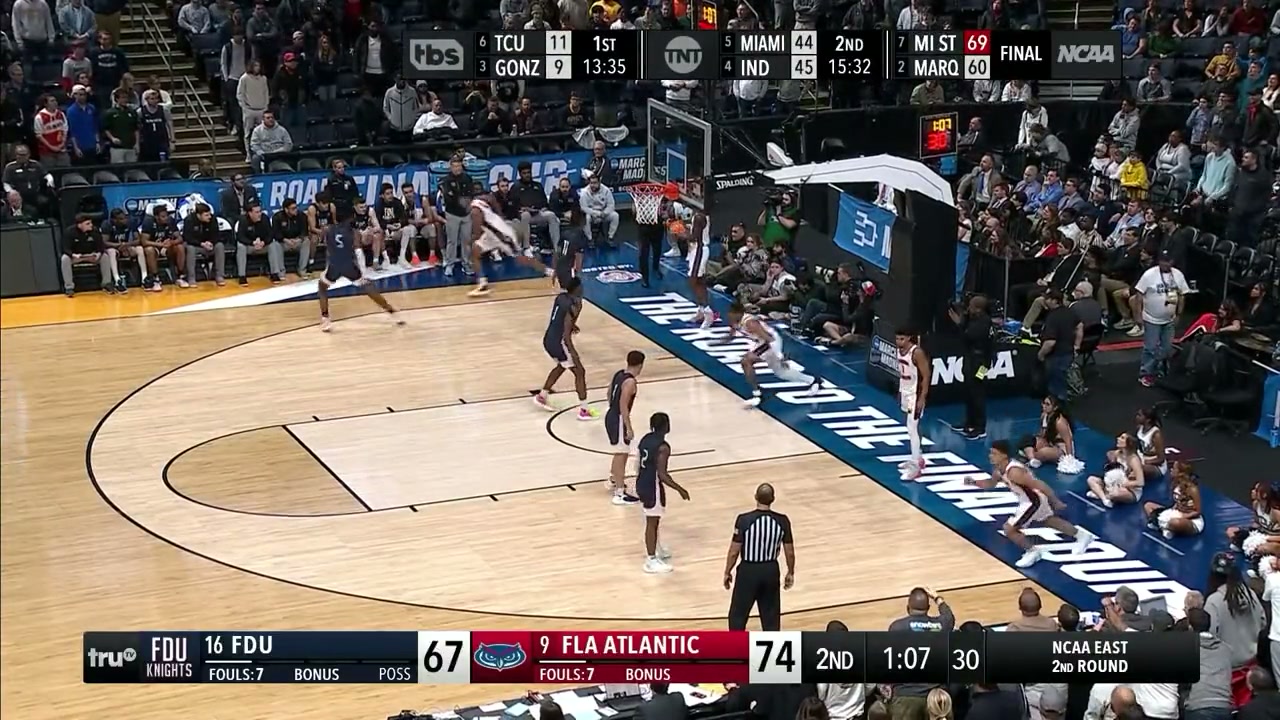 FAU’s 'shotgun' inbounds play, with four players running from the baseline onto the court and a "quarterback" player getting ready to throw the ball