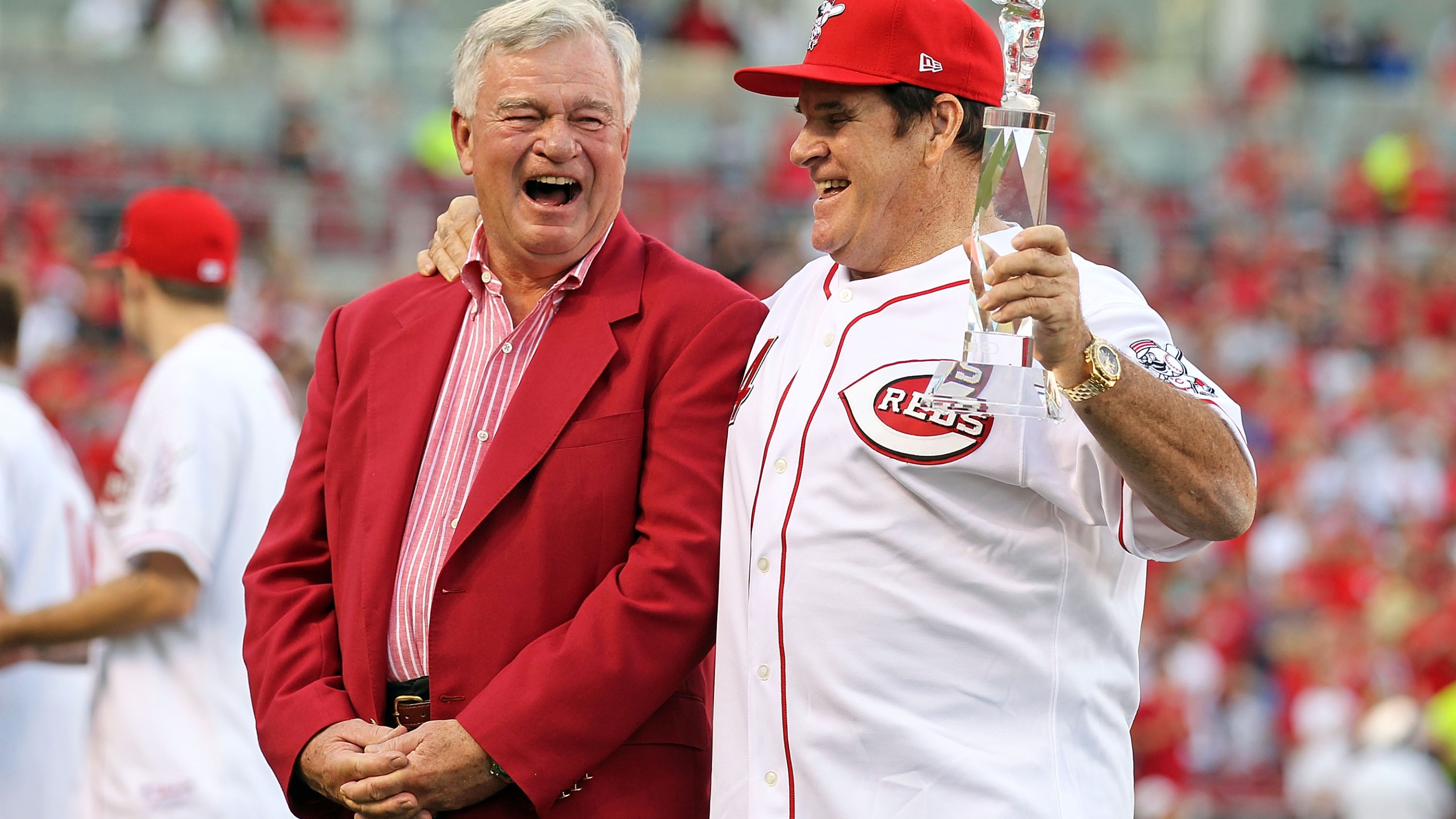 Cincinnati Reds CEO Bob Castellini and disgraced Reds legend Pete Rose yuk it up at an event honoring Rose's hit record, in 2010.