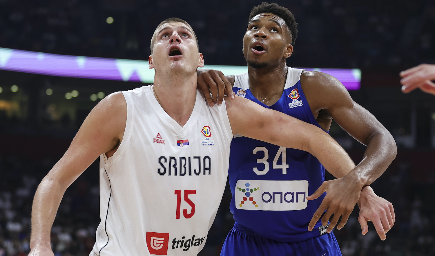 BELGRADE, SERBIA - AUGUST 25: Nikola Jokic (L) of Serbia in action against Giannis Antetokounmpo (R) of Greece during the FIBA Basketball World Cup 2023 Qualifier game between Serbia and Greece at Stark Arena on August 25, 2022 in Belgrade, Serbia. (Photo by Srdjan Stevanovic/Getty Images)