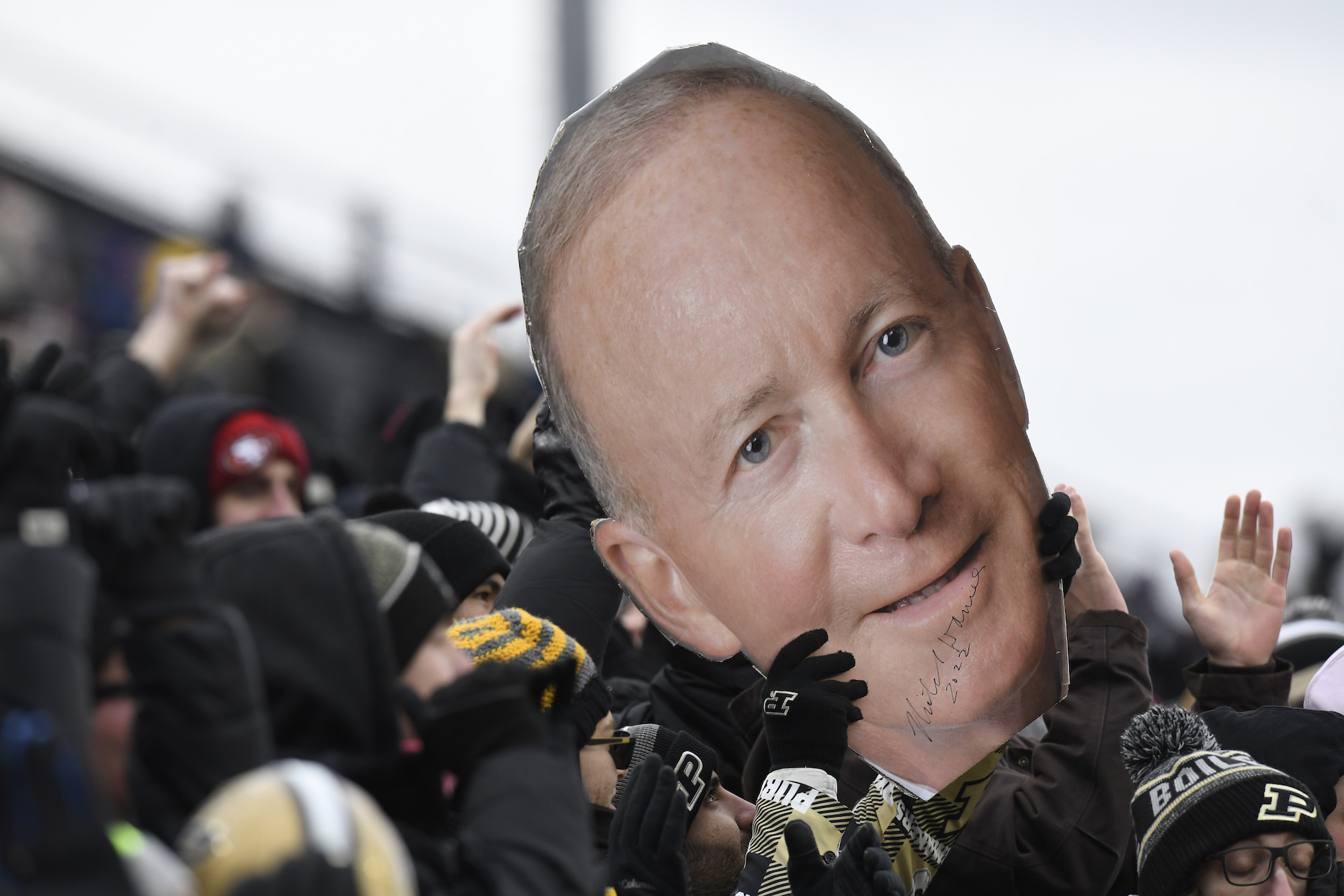 WEST LAFAYETTE, IN - NOVEMBER 19: Purdue students hold up a giant cutout of university president Mitch Daniels during the college football game between the Northwestern Wildcats and the Purdue Boilermakers on November 19, 2022, at Ross-Ade Stadium in West Lafayette, Indiana. (Photo by Michael Allio/Icon Sportswire via Getty Images)