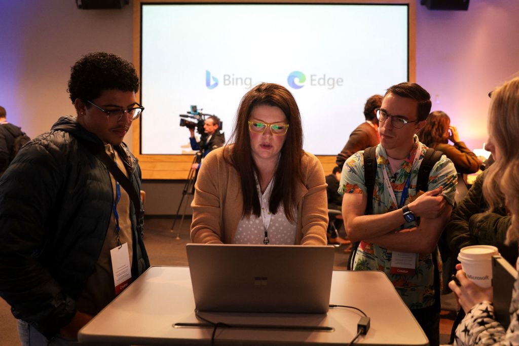 Sarah Mody (C), Senior Product Marketing Manager, Global Search and AI, gives demonstrations in the Bing Experience Lounge with during an event introducing a new AI-powered Microsoft Bing and Edge at Microsoft in Redmond, Washington on February 7, 2023. - Microsoft's long-struggling Bing search engine will integrate the powerful capabilities of language-based artificial intelligence, CEO Satya Nadella said, declaring what he called a new era for online search.