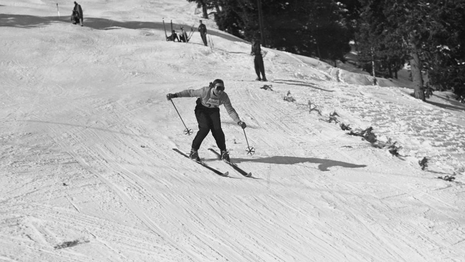 American alpine skier Madi Springer-Miller races against the clock on the slopes of Bald Mountain, Sun Valley, Idaho, 28th November 1951. Springer-Miller is training with other hopefuls for the United States Olympic ski team ahead of the 1952 Winter Olympics in Oslo, Norway.