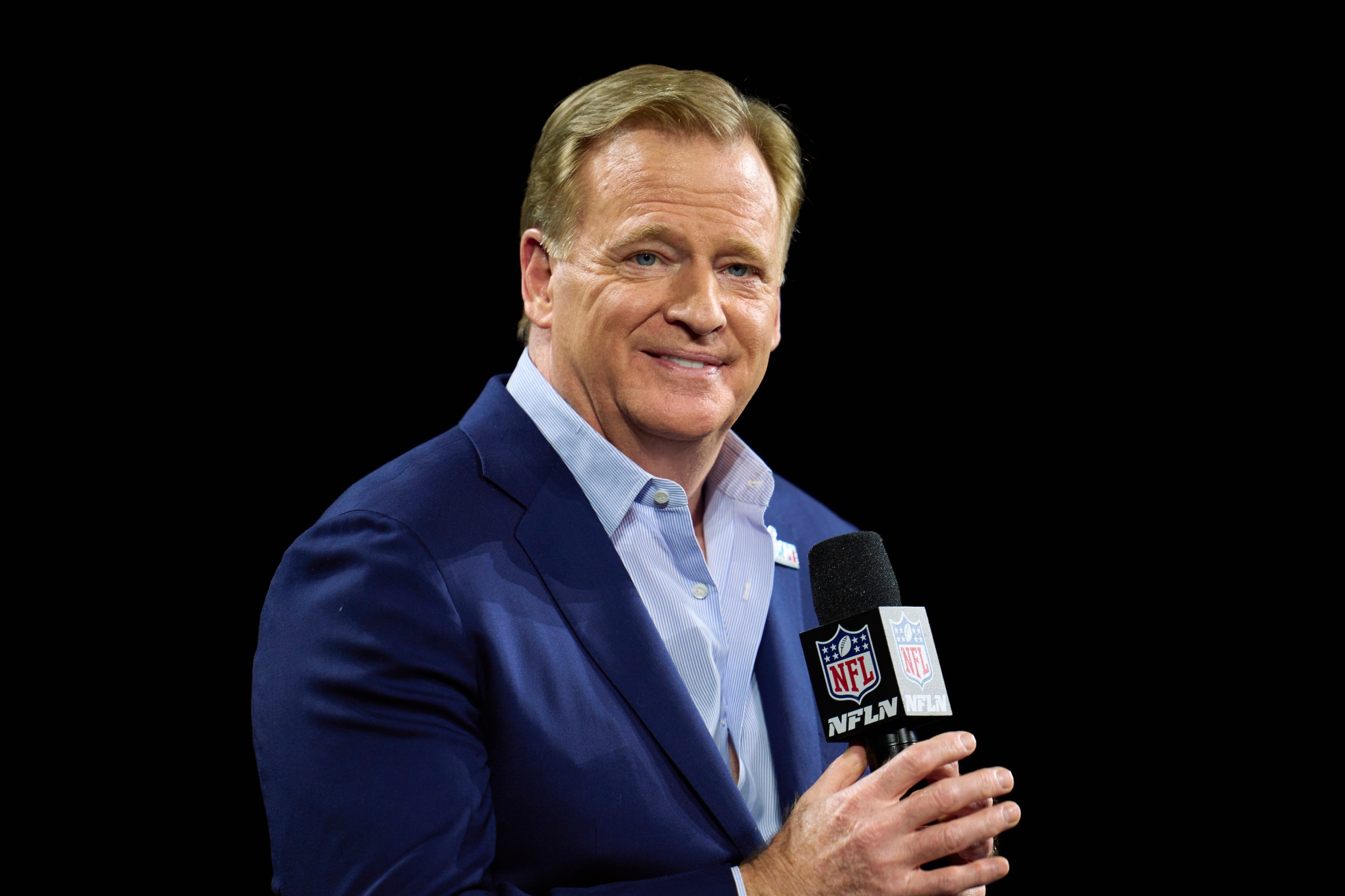 Roger Goodell speaks to the assembled media with kind of a dippy grin on his face before the Super Bowl in February of 2023.