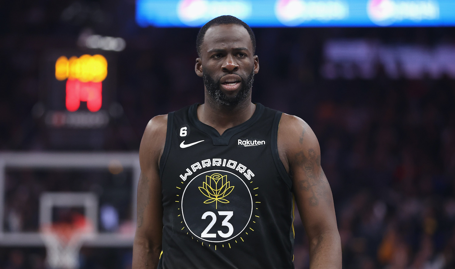 SAN FRANCISCO, CALIFORNIA - FEBRUARY 13: Draymond Green #23 of the Golden State Warriors looks on in the second quarter against the Washington Wizards at Chase Center on February 13, 2023 in San Francisco, California. NOTE TO USER: User expressly acknowledges and agrees that, by downloading and/or using this photograph, User is consenting to the terms and conditions of the Getty Images License Agreement. (Photo by Lachlan Cunningham/Getty Images)