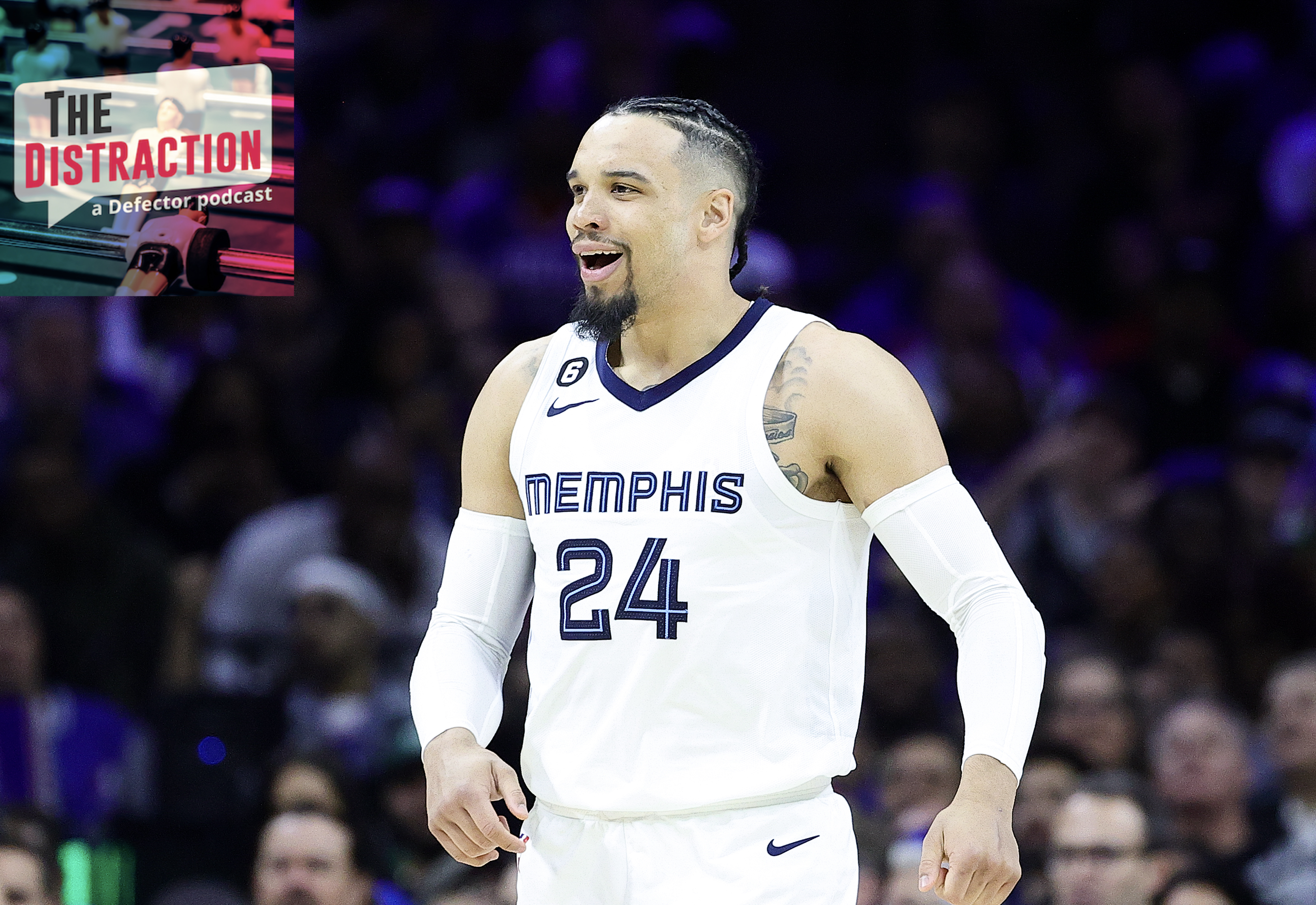 Dillon Brooks smiling on the floor during a Grizzlies game against the Philadelphia 76ers in February of 2023.