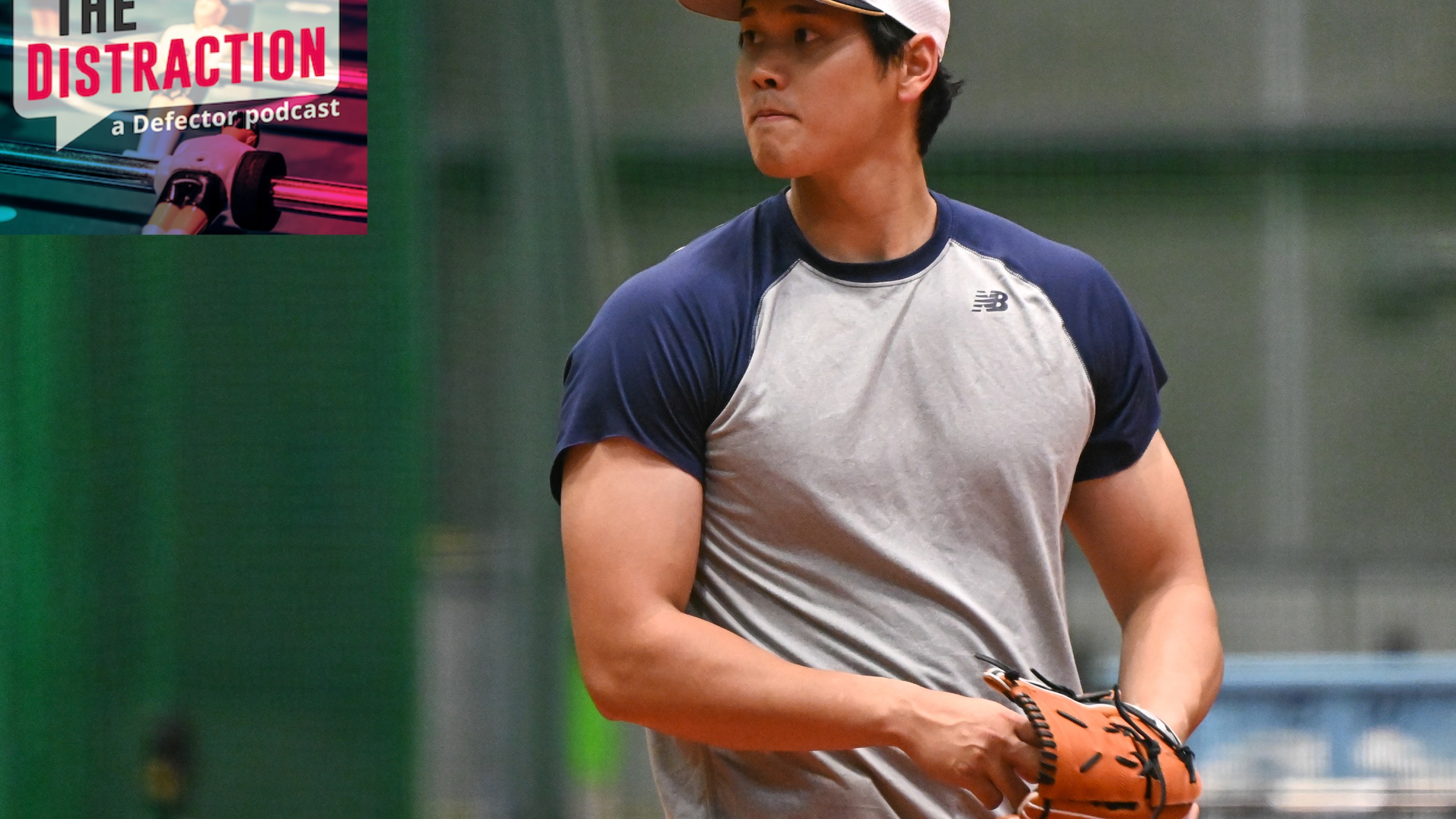 Shohei Ohtani looking swole as hell during Samurai Japan's training before the 2023 World Baseball Classic, with The Distraction logo at upper left.