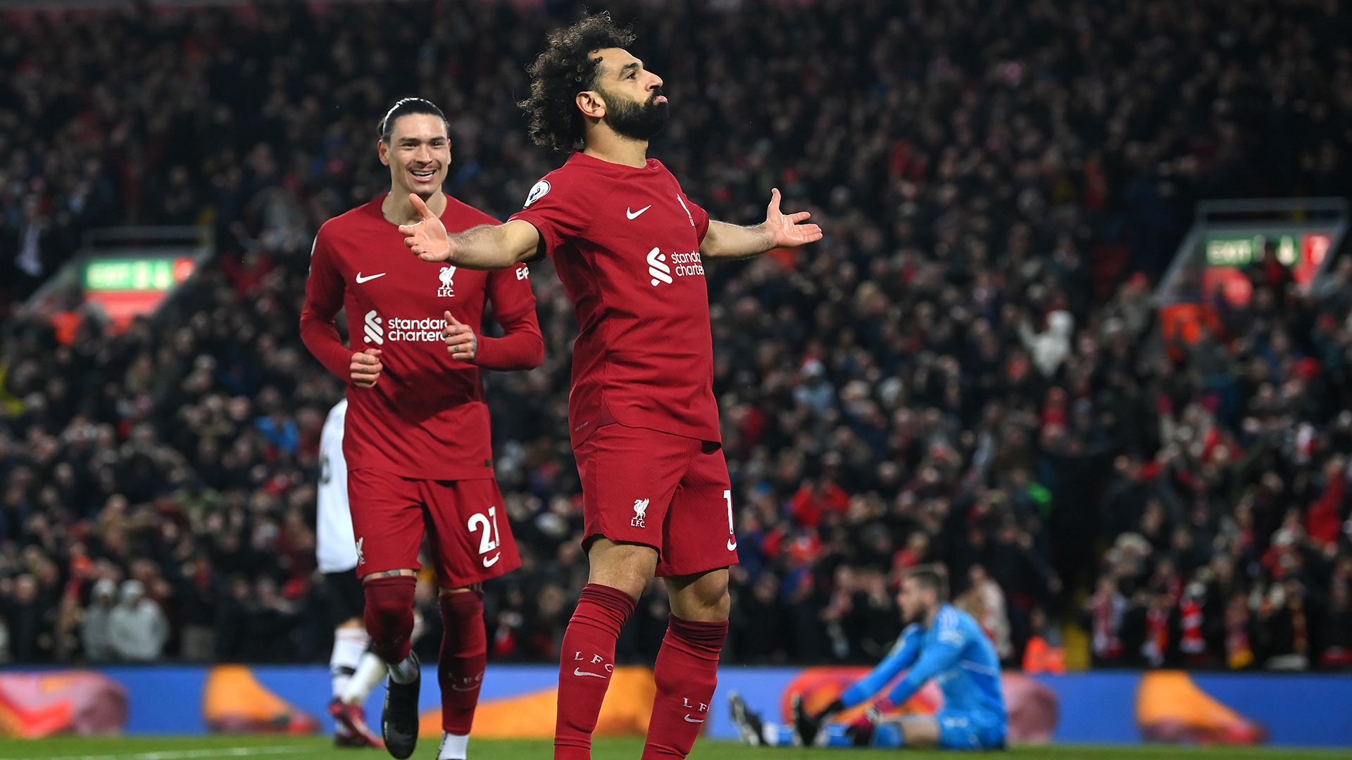 Mohamed Salah of Liverpool celebrates after scoring the team's fourth goal during the Premier League match between Liverpool FC and Manchester United at Anfield on March 05, 2023 in Liverpool, England.