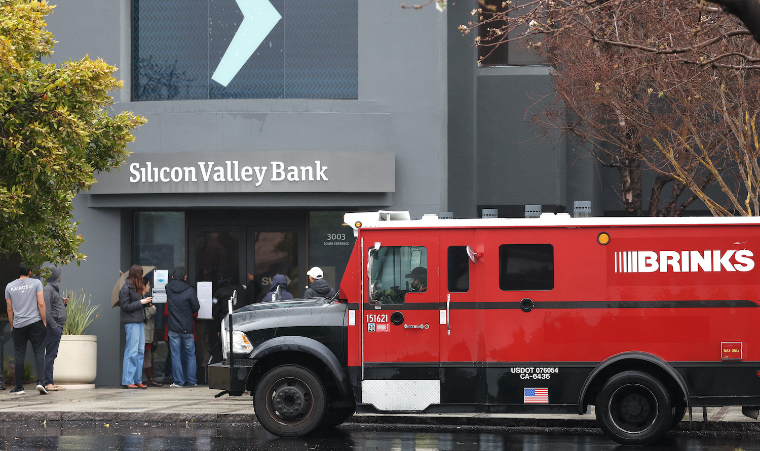 SANTA CLARA, CALIFORNIA - MARCH 10: A Brinks armored truck sits parked in front of the shuttered Silicon Valley Bank (SVB) headquarters on March 10, 2023 in Santa Clara, California. Silicon Valley Bank was shut down on Friday morning by California regulators and was put in control of the U.S. Federal Deposit Insurance Corporation. Prior to being shut down by regulators, shares of SVB were halted Friday morning after falling more than 60% in premarket trading following a 60% declined on Thursday when the bank sold off a portfolio of US Treasuries and $1.75 billion in shares to cover declining customer deposits. (Photo by Justin Sullivan/Getty Images)