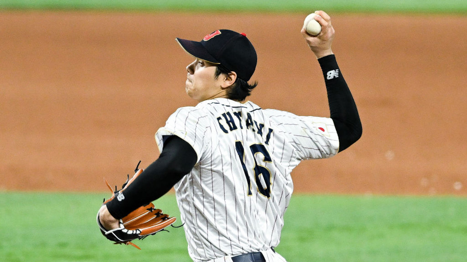 MIAMI, FLORIDA - MARCH 21: Shohei Ohtani #16 of Team Japan pitches in the top of the 9th inning during World Baseball Classic Championship between United States and Japan at loanDepot park on March 21, 2023 in Miami, Florida.