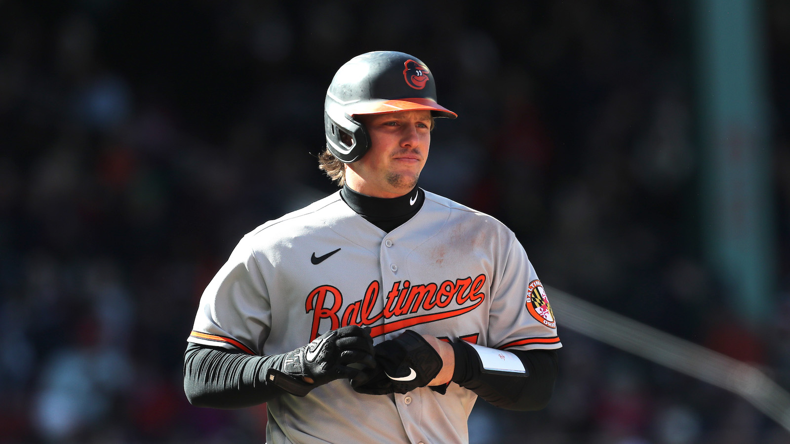 BOSTON, MASSACHUSETTS - MARCH 30: Adley Rutschman #35 of the Baltimore Orioles reacts during the fourth inning against the Boston Red Sox on Opening Day at Fenway Park on March 30, 2023 in Boston, Massachusetts.