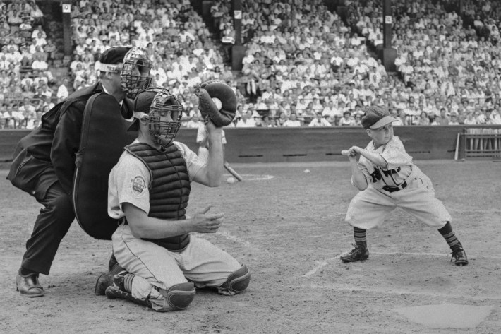 Satchel Paige Pitching For St. Louis by Bettmann