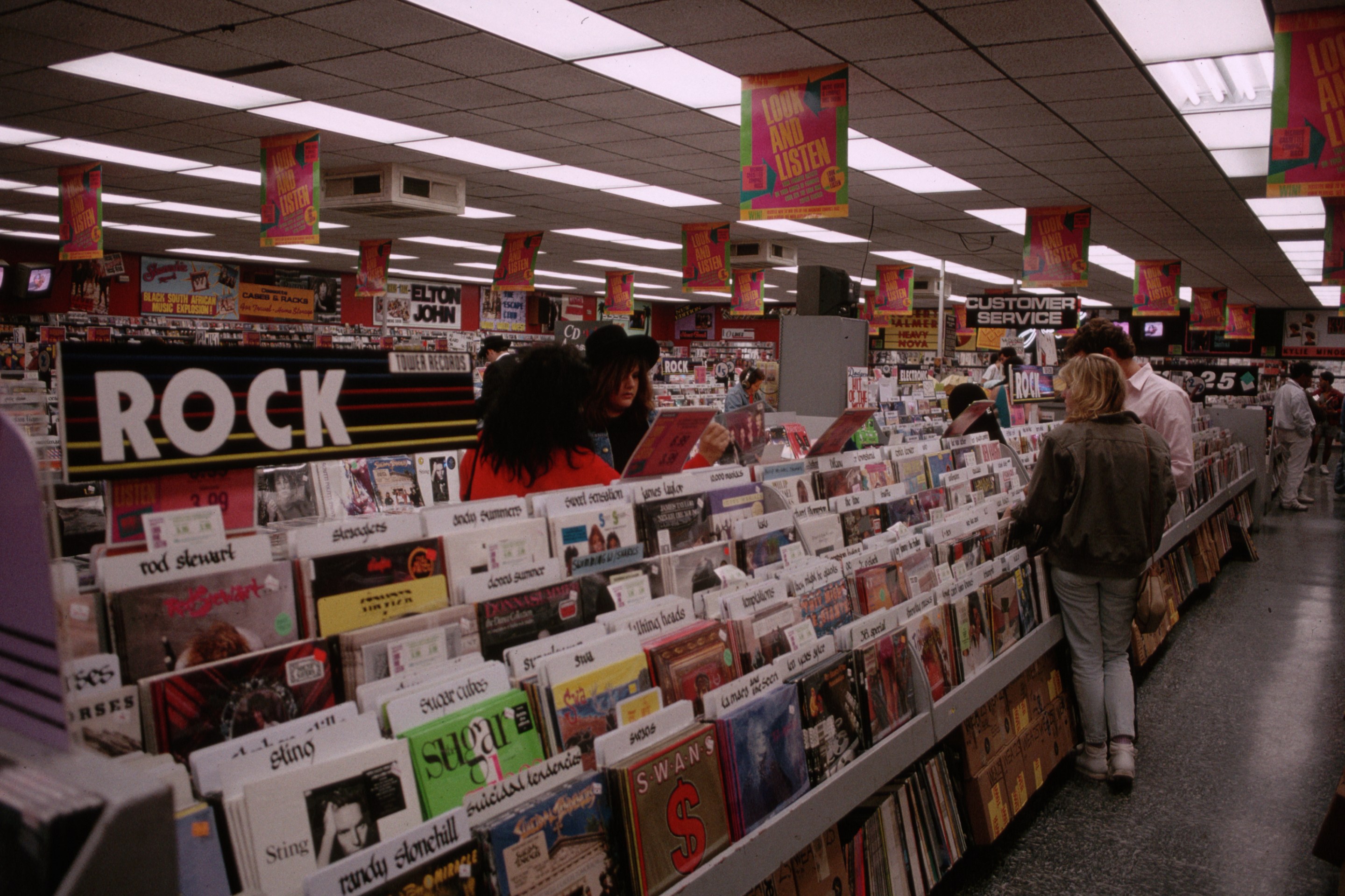 Shoppers Looking at Records at Tower Records on Sunset Boulevard (Photo by nik wheeler/Corbis via Getty Images)